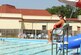 Head lifeguard Kari Anne Griffin observes swimmers at the North Pool on Barksdale Air Force Base, La., June 11. Base lifeguards are mostly students who dedicate their summer helping ensure the safety of Team Barksdale members and their families who visit the pools on base. (U.S. Air Force photo/Airman 1st Class Benjamin Gonsier)(RELEASED)