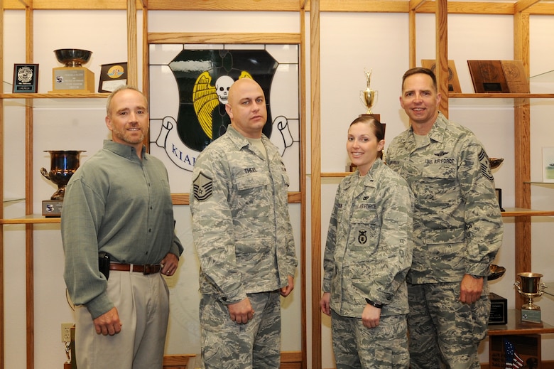 MINOT AIR FORCE BASE, N.D. -- 5th Bomb Wing Antiterrorism Officers: Mr. P.J. Pallotta and Master Sgt. William Theel; 91 Missile Wing Antiterrorism Officer: 1st Lt. Stephanie Reichlin and Chief Master Sgt. Kevin Jurgella. (Not Pictured: Mr. Rob Pulkinen, 91 MW Antiterrorism Officer)

The 5th Bomb Wing in concert with the 91 Missile Wing Antiterrorism Office assist leadership in implementing Joint, Department of Defense, GCC and Air Force AT-related doctrine, policy and tactics, techniques, and procedures. They also provide AT considerations, to include real-world and exercise lessons learned, into appropriate concepts of operations. The Antiterrorism office through the Threat Working Group also ensures the safety of the base population by recommending the appropriate Force Protection Condition during emergency or contingency situations. (Photo Submission/Staff Sgt. Carmen Washington)
