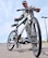 Lt. Col. Clinton Burpo stands with his trusty bicycle at McConnell Air Force Base, Kan., June 12, 2012. Burpo has logged more than 21,700 miles on his bicycle since he began using it to commute to and from work in 2006. Burpo is a 931st Air Refueling Group logistics readiness officer, (U.S. Air Force photo/1st Lt. Zach Anderson) 
