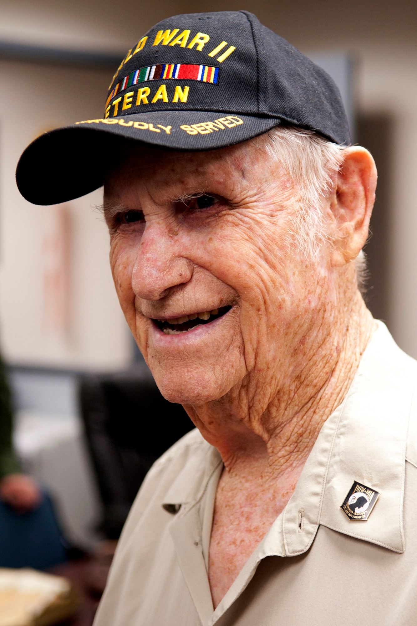 Claude McCrocklin is the guest of honor during a Room Dedication ceremony at the 11th Bomb Squadron, Barksdale Air Force Base, La., June 1, 2012. McCrocklin, a former prisoner of war, was recognized for his service and sacrifice during World War II as a bombardier on B-24 Liberators. (U.S. Air Force photo by Master Sgt. Greg Steele/Released)