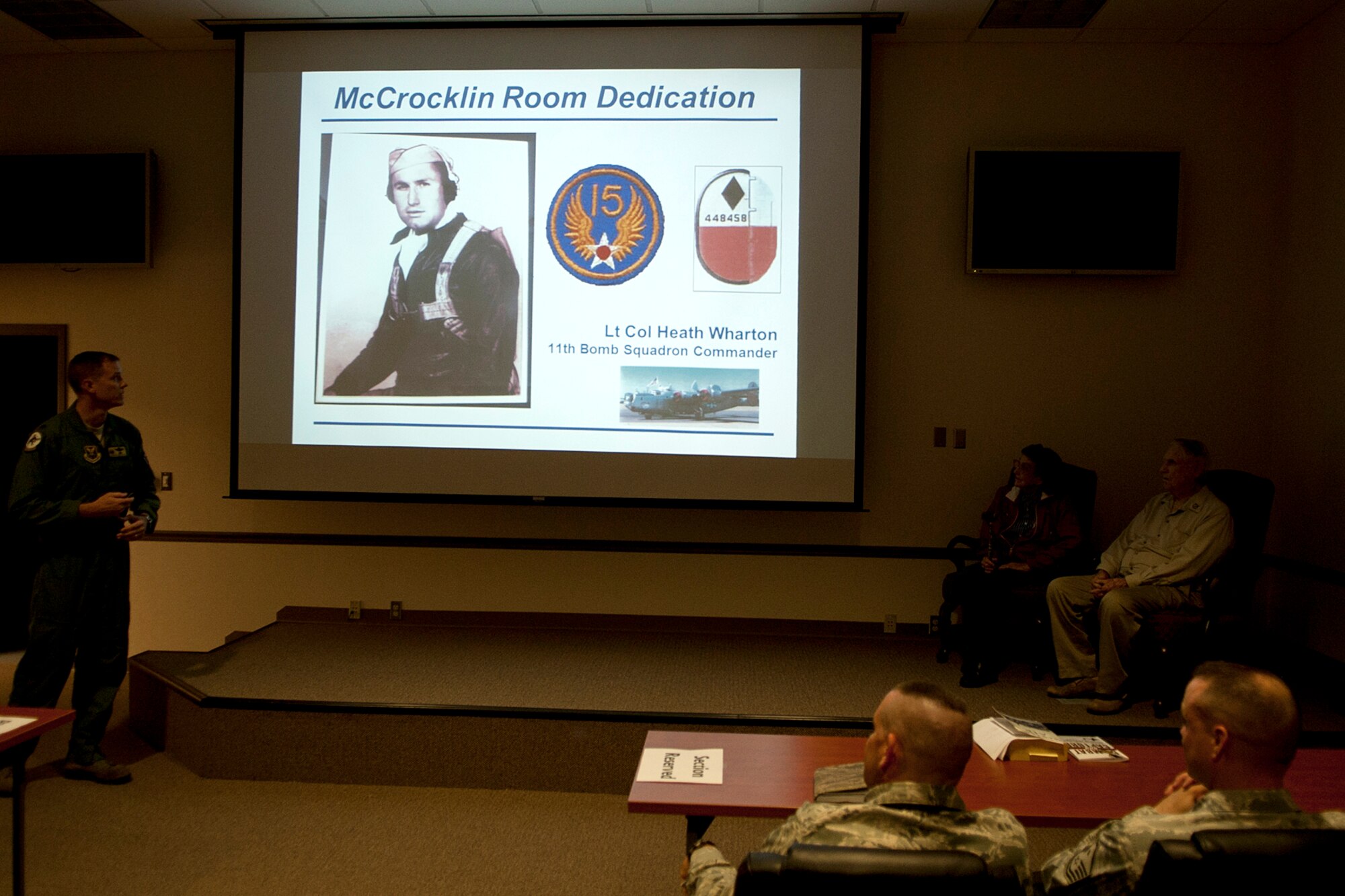 The 11th Bomb Squadron dedicates a conference room in honor of Claude McCrocklin, Barksdale Air Force Base, La., June 1, 2012. McCrocklin was a bombardier on B-24 Liberators during World War II and was shot down, spending over a year in a German prison camp. (U.S. Air Force photo by Master Sgt. Greg Steele/Released)
