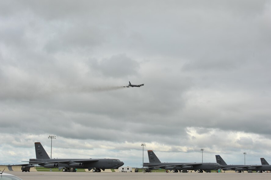 MINOT AIR FORCE BASE, N.D. -- B-52H Stratofortresses waits to enter the runway during a rapid launch that concluded the exercise Constant Vigilance, here June 11. The rapid launch helps pilots and crew members train for a real life instance in which they could be notified to deliver their support at their request of combatant commanders as quickly as possible. (U.S Air Force photo/Airman 1st Class Andrew Crawford)