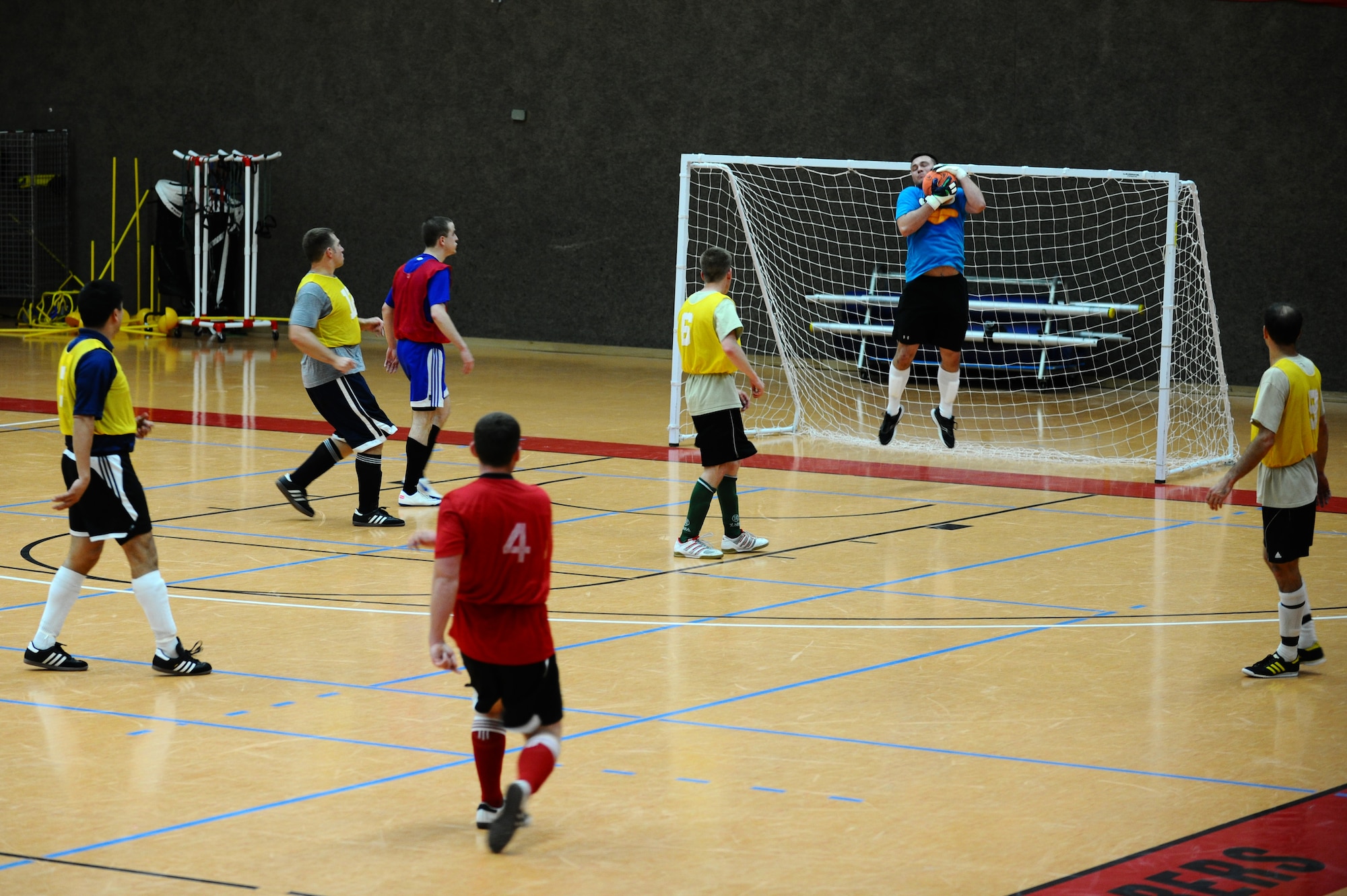 SPANGDAHLEM AIR BASE, Germany – Kyle Jones, 81st Fighter Squadron, makes a save during the indoor soccer championship at the Skelton Memorial Fitness Center here June 12. The 52nd Force Support Squadron defeated the 81st FS in the first game 7-6. The 81st FS won the double-elimination championship after winning the second game 9-5. (U.S. Air Force photo by Airman 1st Class Matthew B. Fredericks/Released)