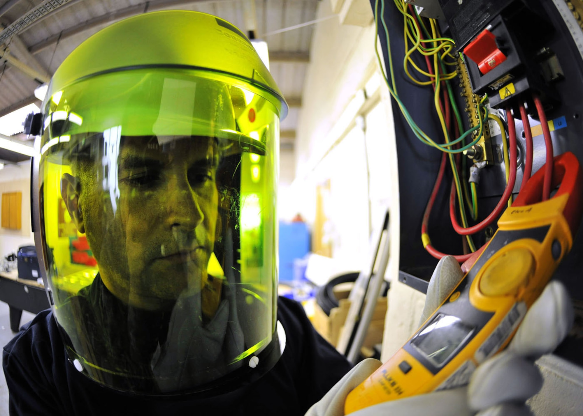 RAF MILDENHALL, England -- Senior Master Sgt. Emilio Hernandez, 100th Civil Engineer Squadron Operations flight superintendent, inspects an electrical distribution panel box here recently. Hernandez was chosen as one of the U.S. Air Force's 12 Outstanding Airmen of the Year for 2012. In addition to being awarded the Outstanding Airman ribbon with the bronze star device, he will serve on the Air Force Enlisted Council for one year, representing Team Mildenhall and helping shape the future of the Air Force. (U.S. Air Force photo/Senior Airman Jerilyn Quintanilla)