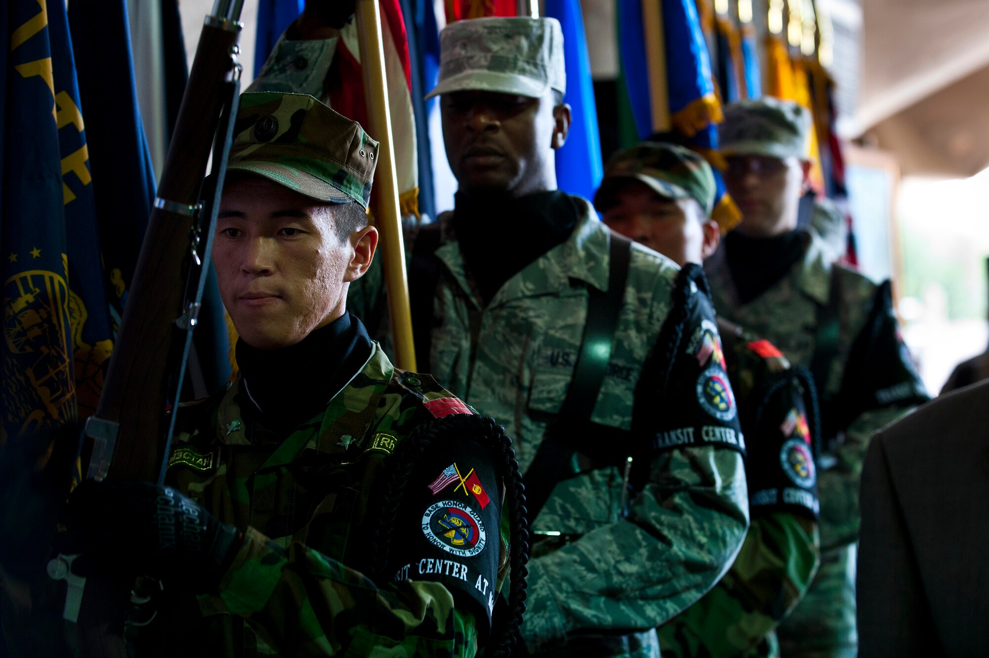A multi-national color guard comprised of U.S. and Kyrgyz Republic honor guardsmen post the colors during the 376th Air Expeditionary Wing change of command ceremony, Transit Center at Manas, Kyrgyzstan, June 13, 2012. The partnership between the two honor guards is emblematic of the strong relationship between the two nations.  (U.S. Air Force photo/Senior Airman Brett Clashman)