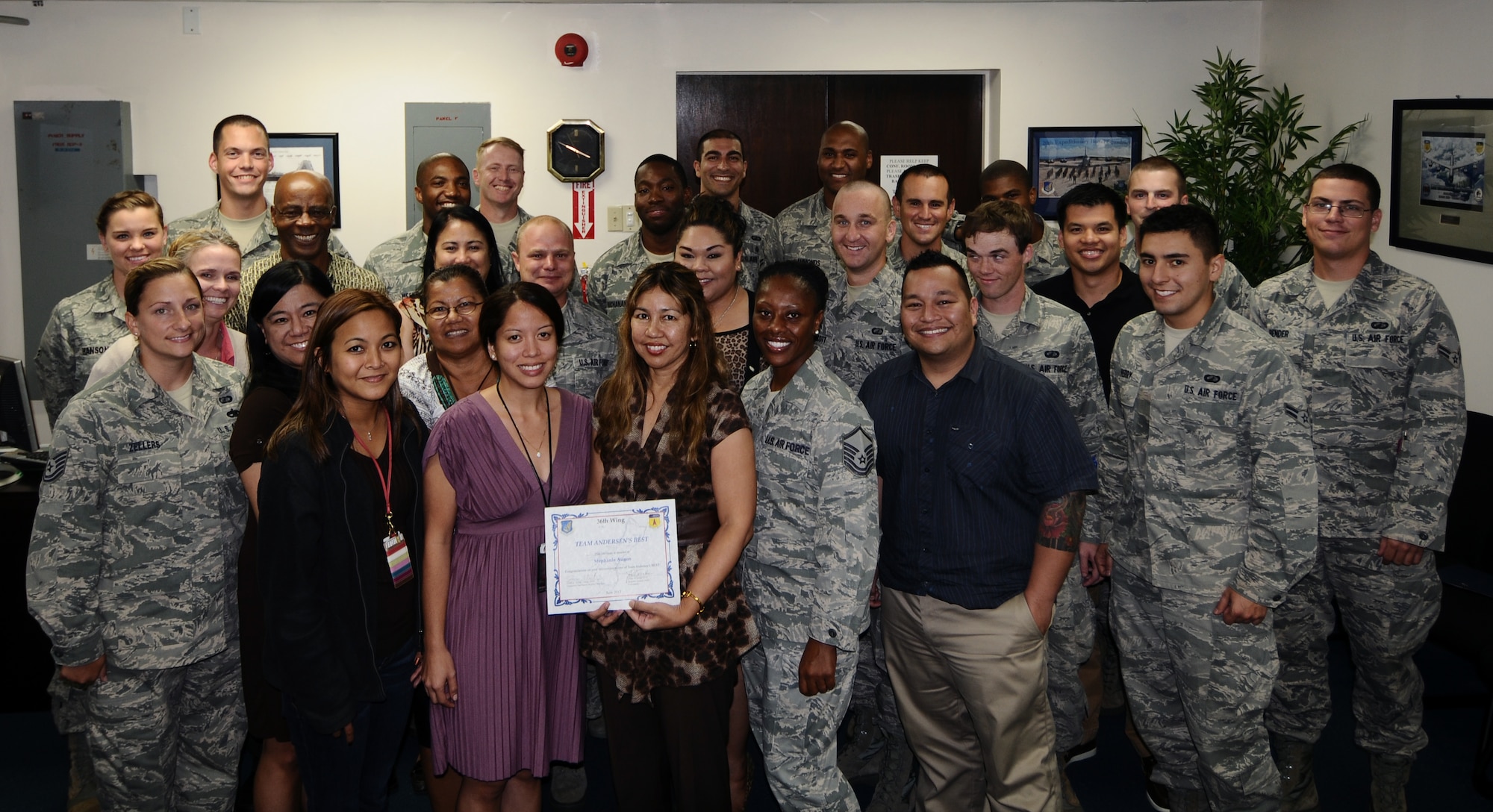 Stephanie Aguon, quality assurance personnel coordinator and contract specialist, was awarded Andersen's Best June 7. Andersen's Best is a recognition program which highlights a top performer from the 36th Wing. Each week, supervisors nominate a member of their team for outstanding performance and the wing commander presents the selected Airman/civilian with an award. To nominate your Airman/civilian for Andersen's Best, contact your unit chief or superintendent explaining their accomplishments. (U.S. Air Force photo by Airman 1st Class Mariah Haddenham/Released)