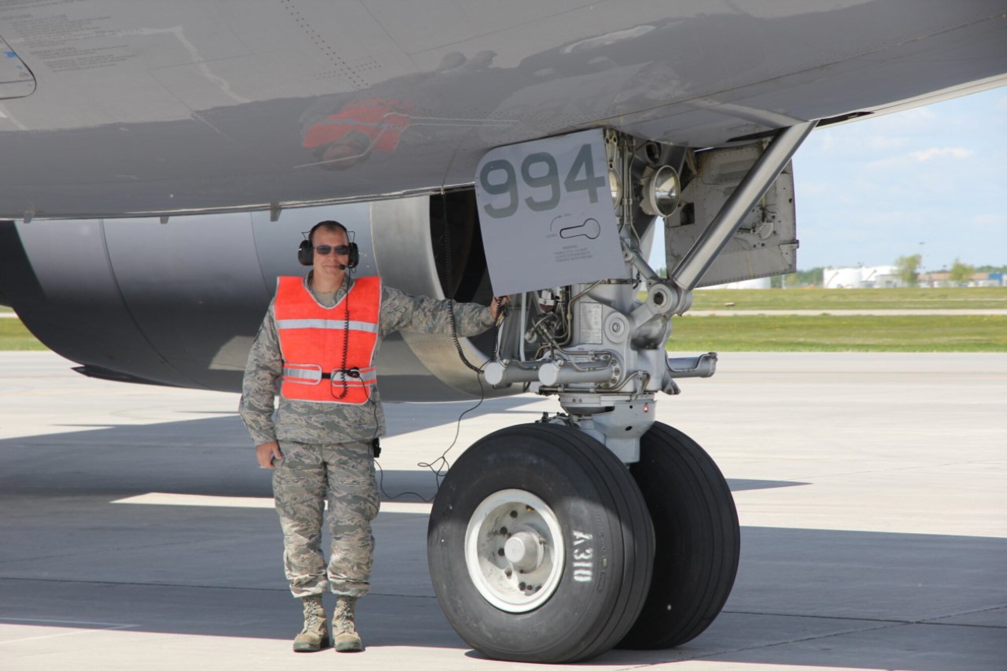 Master Sgt. Edward D. Hendershot of the 46th Aerial Port Squadron, Dover Air Force Base, Del., poses at Cold Lake Air Base in Alberta, Canada, after marshaling an Airbus aircraft for the first time. He is in Canada with the 512th Airlift Control Flight supporting the Maple Flag exercise. (Courtesy photo)