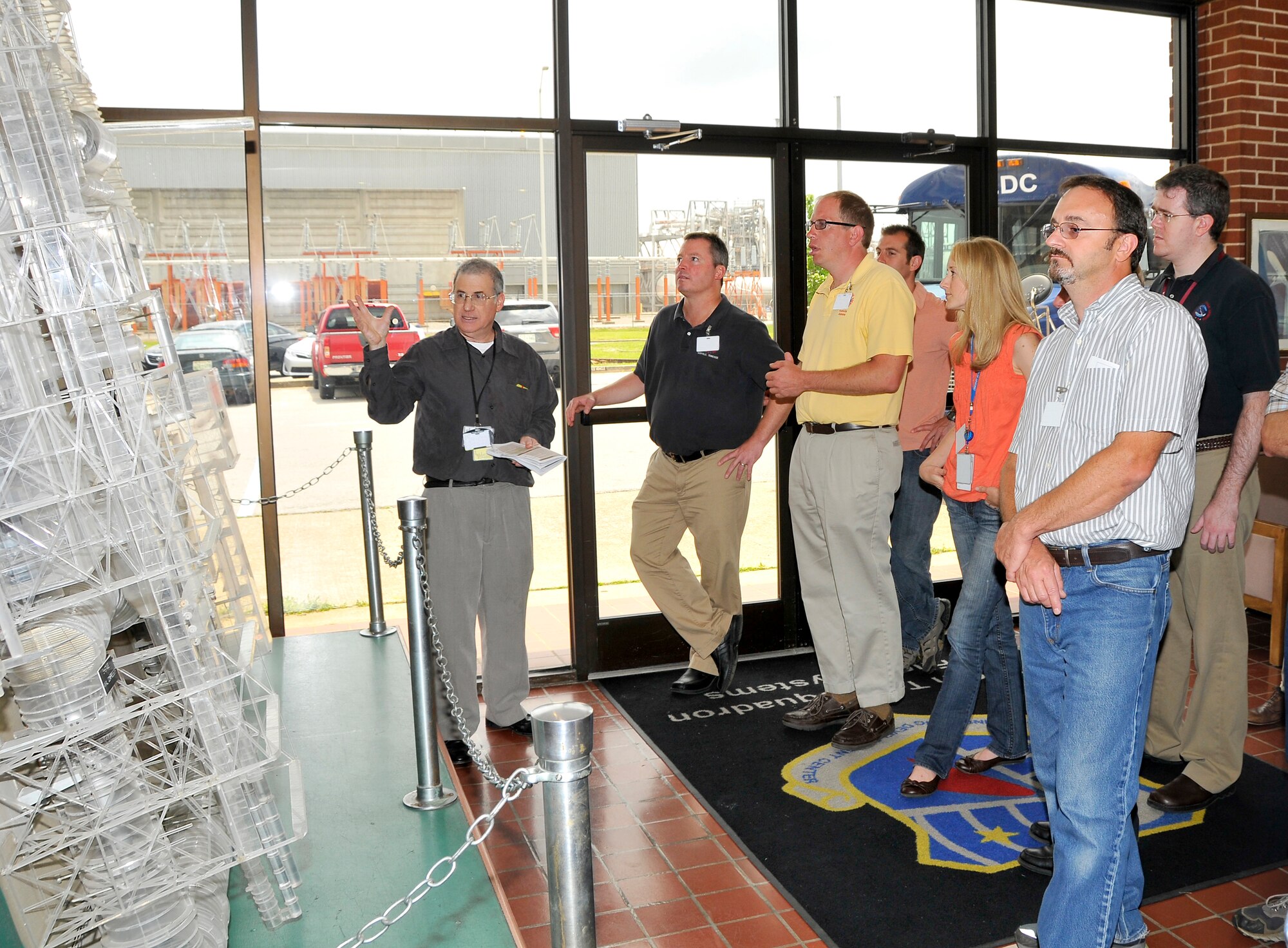 Phillip Lorenz, ATA Public Affairs, explains to National Weather Service employees the importance of the Propulsion Wind Tunnel Test Facility. (Photo by Jacqueline Cowan)