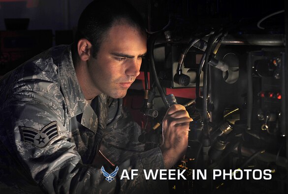 Senior Airman Christopher Gate checks a communications cable on a radio pallet used inside Humvees during inspection at Pope Air Force Base, N.C., June 12, 2012. Gate is an electrical power production journeyman assigned to the 14th Air Support Operations Squadron. (U.S. Air Force photo/Val Gempis)