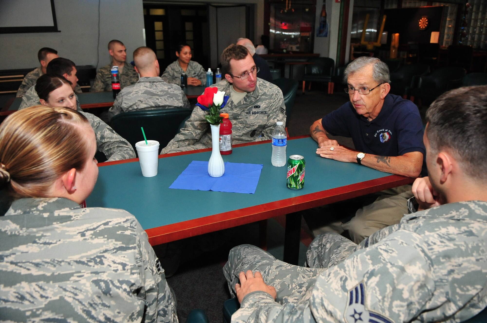 Leon Skelton, a retired chief master sergeant speaks to Airman Leadership School students during an Air Force Sergeants Association Chapter 972 sponsored lunch June 13, 2012, McConnell Air Force Base, Kan. The local AFSA chapter sponsors a lunch for each McConnell ALS class to allow students to interact with retired Air Force chiefs. The local chapter is part of a nationwide organization that advocates improvement for the quality of life and economic fairness of Air Force enlisted personnel and their families. (U.S. Air Force photo/Staff Sgt. Maria A. Ruiz) 