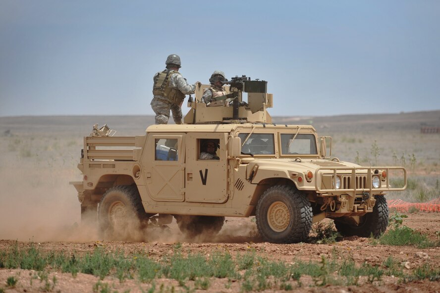 A Humvee navigates through rough terrain during training at Melrose Air Force Range, N.M., June 11, 2012. Teams spent the day at the range practicing tactics and perfecting skills. (U.S. Air Force photo by Airman 1st Class Alexxis Pons Abascal)