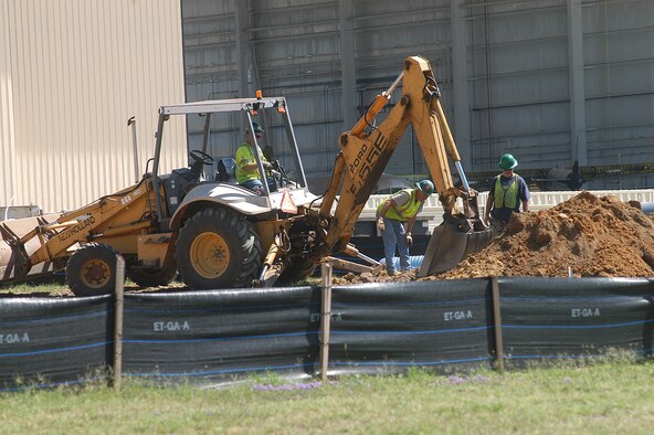 Construction is in progress on a parking lot adjacent to Bldg. 2390 along Perimeter Road. (U. S. Air Force photo/Sue Sapp)