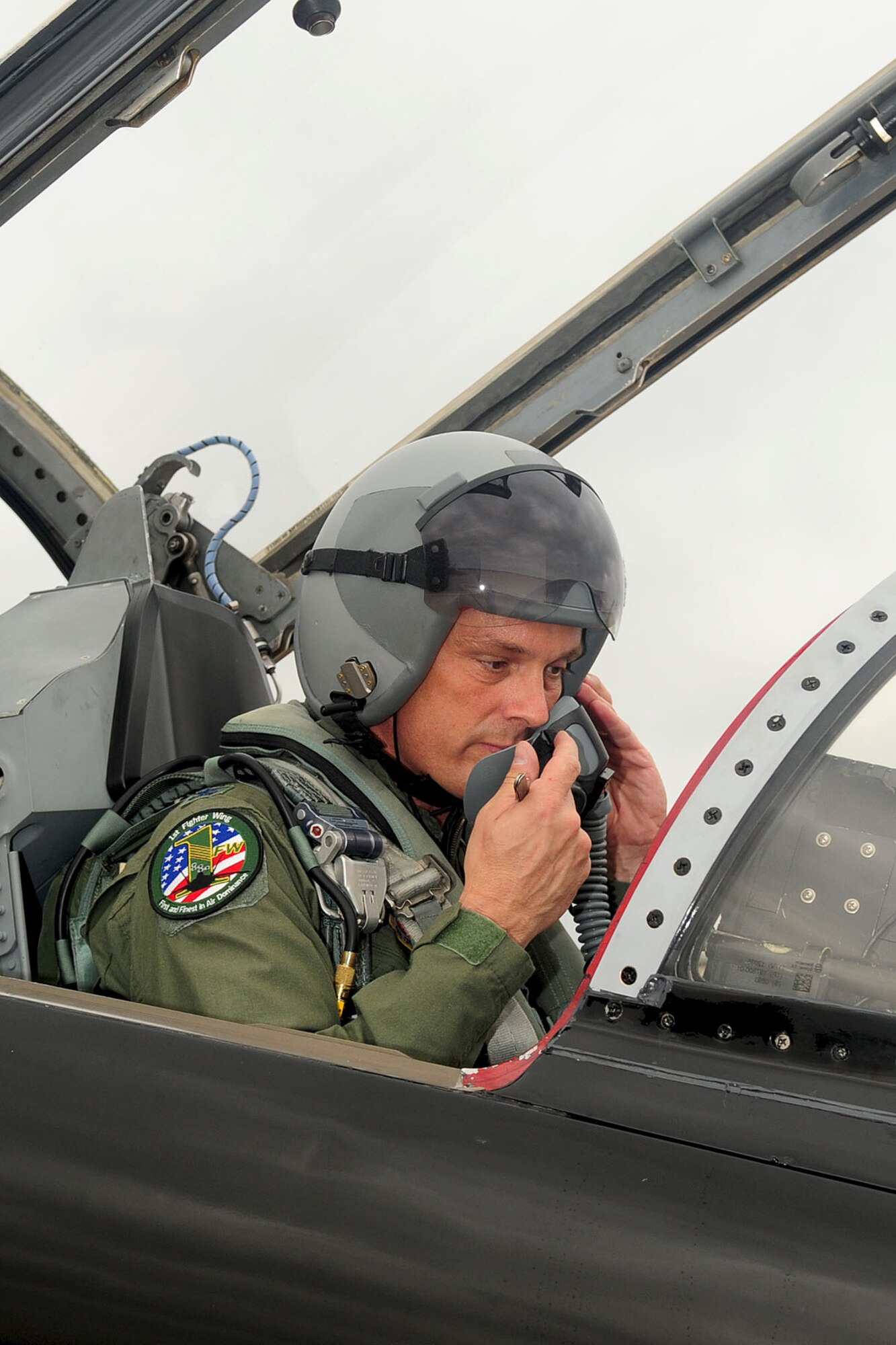 U.S. Air Force Col. Kevin Mastin, 1st Fighter Wing vice commander, conducts a radio check before taking off during his final flight at Langley Air Force Base, Va., June 13, 2012. Mastin was vice commander of the fighter wing from June 2010 to June 2012. (U.S. Air Force photo by Staff Sgt. Ashley Hawkins/Released)