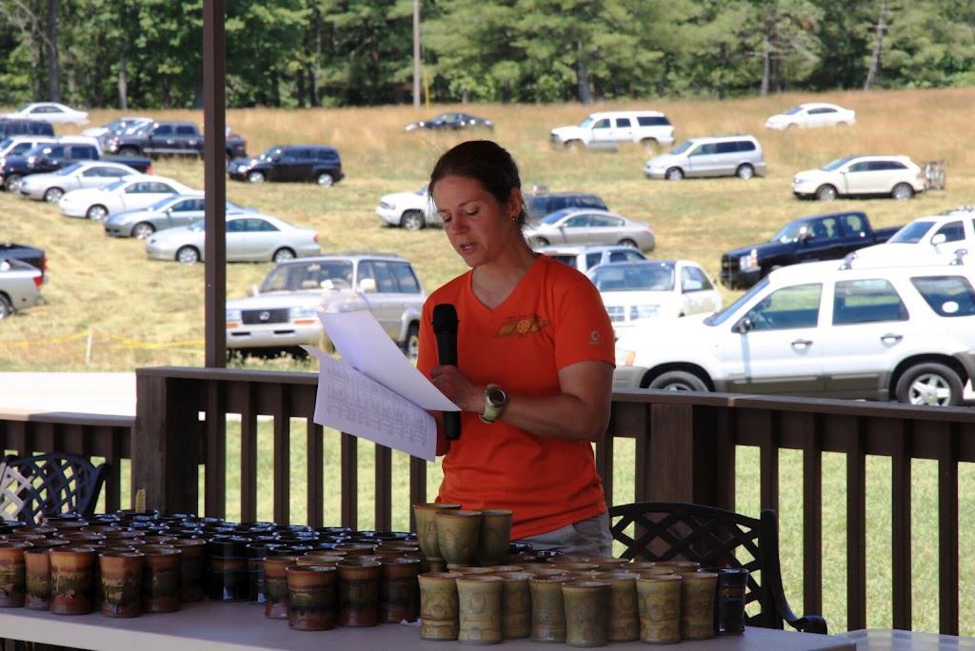 Race director Melissa Miller announces award winners at the conclusion of the 30th annual running of the Mach Tenn triathlon. (Photo provided)