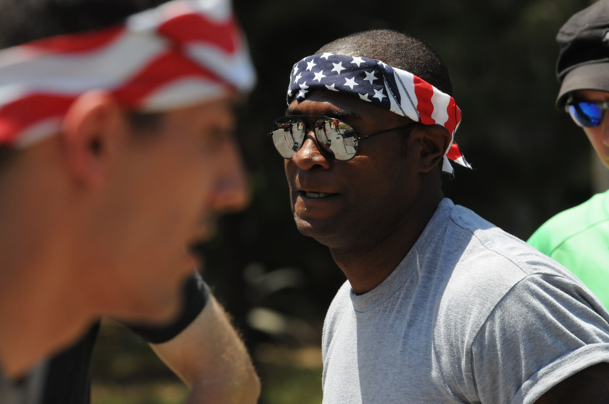 Tech. Sgt. Curtis Hill, 39th Air Base Wing Staff, takes a breather after completing the High Fly'n event at the 'Lik Fit Games June 8, 2012, at Incirlik Air Base, Turkey.   Four teams participated in the events, which included three sets of obstacles designed to mentally and physically challenge participants. (U.S. Air Force photo by Senior Airman Marissa Tucker/Released)
