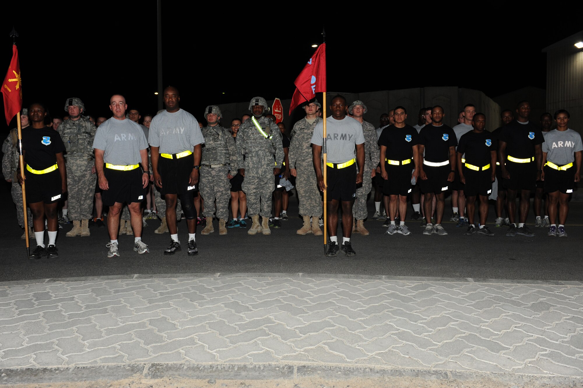 SOUTHWEST ASIA - Soldiers from the 1st Battalion, 7th Air Defense Artillery Regiment stand in formation prior to a 5K run/ruck march at the 380th Air Expeditionary Wing June 14, 2012. The run was in celebration of the U.S. Army's 237th birthday. The Soldiers are deployed from Fort Bragg, N.C. (U.S. Air Force photo/Master Sgt. Scott MacKay)