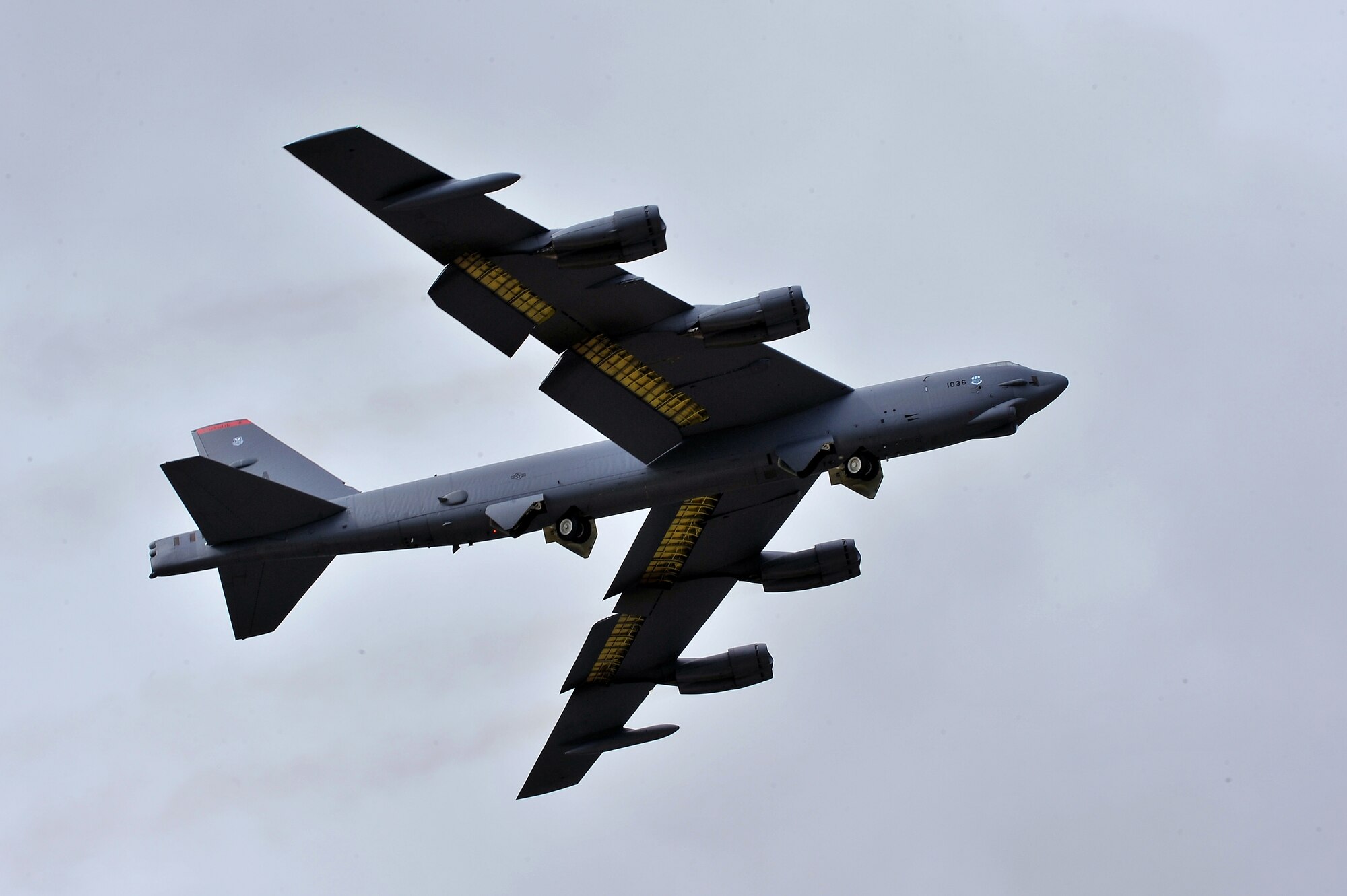 MINOT AIR FORCE BASE, N.D. – A B-52H Stratofortress takes off as part of a rapid launch during an annual exercise here June 11. As a finale for the exercise, several B-52s took off in rapid succession, signaling the end of the training mission. The exercise provides training opportunities for forces to deter, and if necessary defeat, a military attack against the United States. The rapid launch included 17 B-52s from both Minot AFB and Barksdale AFB. (U.S. Air Force photo/Senior Airman Jesse Lopez)