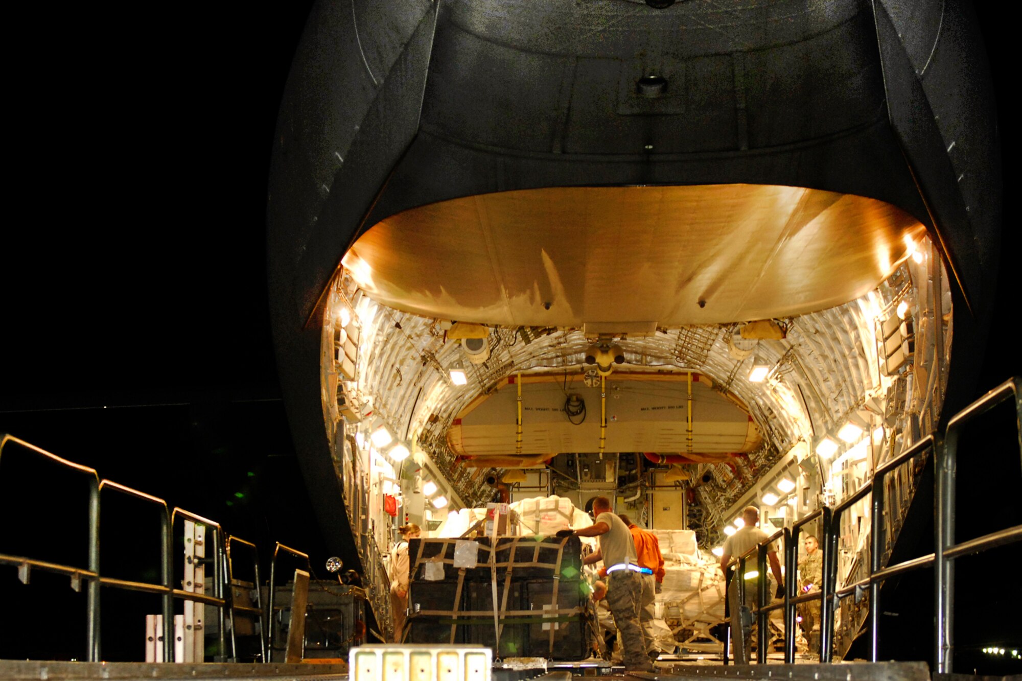 Airmen unload cargo from a U.S. Air Force C-17 Globemaster III 
at Bagram Airfield, Afghanistan, June 6, 2012. Hundreds of passengers and 
more than one million pounds of cargo process through Bagram daily in support 
of U.S. and Coalition Forces in Afghanistan. (U.S. Air Force photo/Staff Sgt. Jeff Nevison)