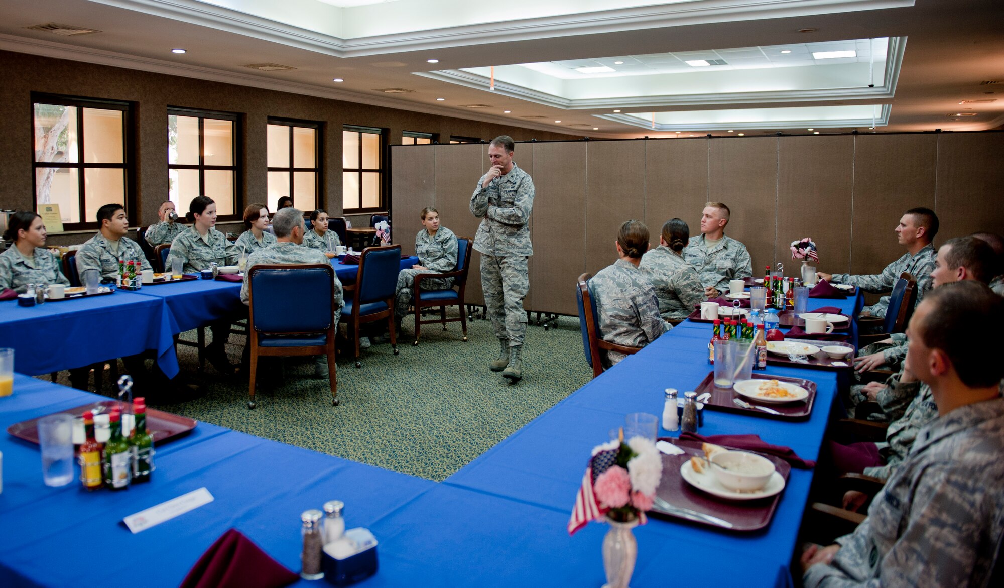 Brig. Gen. Warren D. Berry, Director of Logistics, Installations and Mission Support, Headquarters U.S. Air Forces in Europe, Ramstein Air Base, Germany, standing, talks with officers during a leadership seminar breakfast June 13, 2012, at Incirlik Air Base, Turkey. Berry discussed several topics and emphasized the importance of networking, making what you do matter and appreciating those who have helped you succeed. (U.S. Air Force photo by Senior Airman Anthony Sanchelli/Released) 
