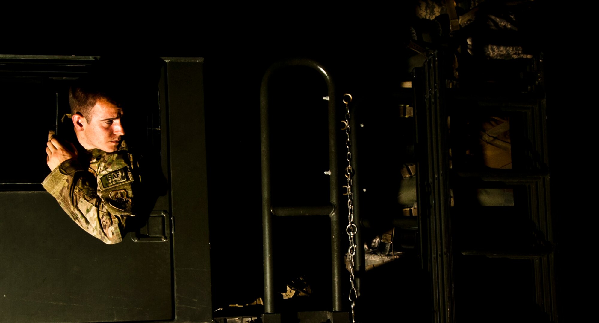 Senior Airman David Boido, 455th Expeditionary Aerial Port Squadron Passenger Services representative, ensures the cargo in his 10K front-loader is secure before delivering it to an aircraft. Personnel with 455 EAPS process more than 1 million pounds of cargo every day in support of U.S. and Coalition forces operating in Afghanistan. (U.S. Air Force photo/Capt. Raymond Geoffroy)