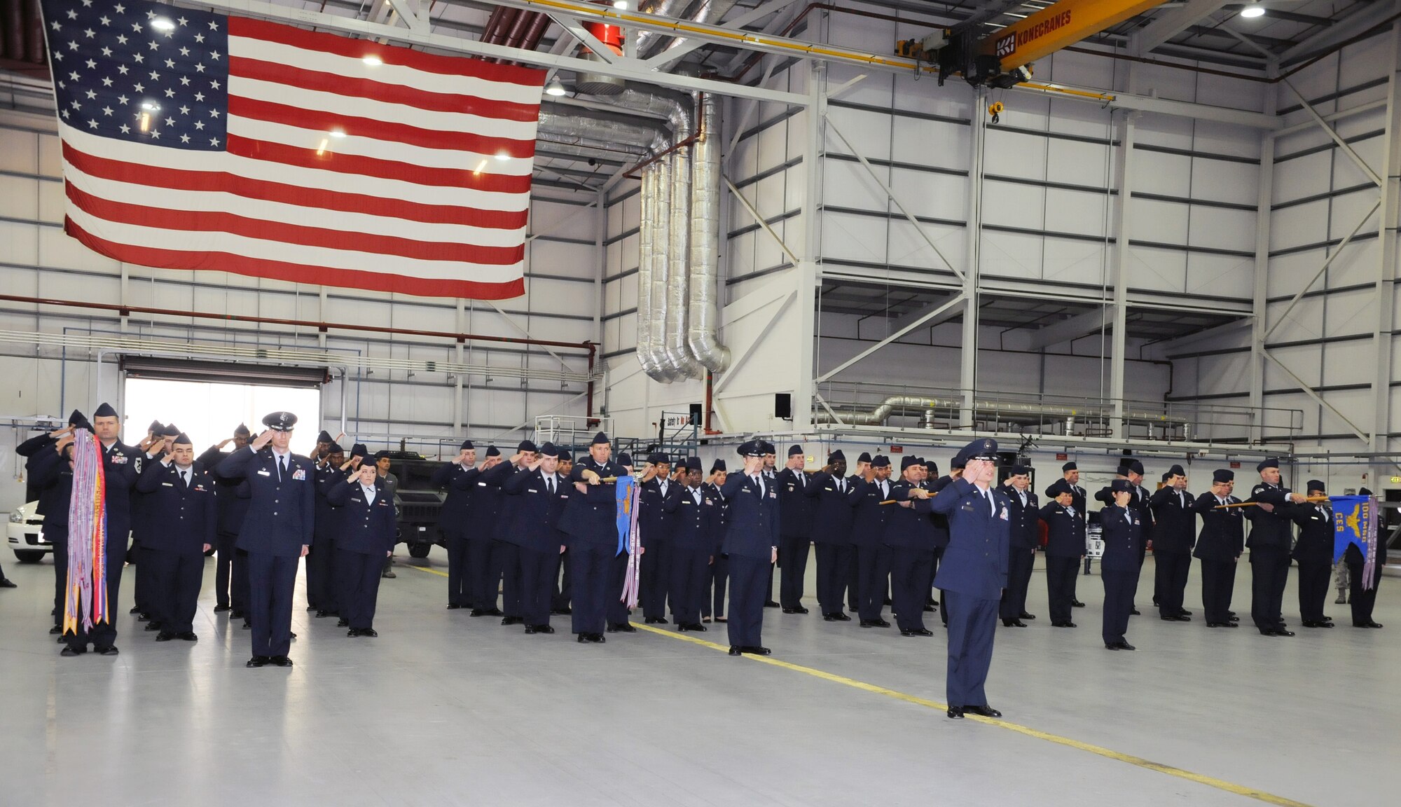 RAF MILDENHALL, England – Airmen from the 100th Mission Support Group render their first salute to their new commander Col. Daniel Merry, 100th MSG, during the 100th MSG change of command here June 13, 2012. Merry assumed command of the 100th MSG in place of Col. David Doe. (U.S. Air Force photo/Toni Dineen)