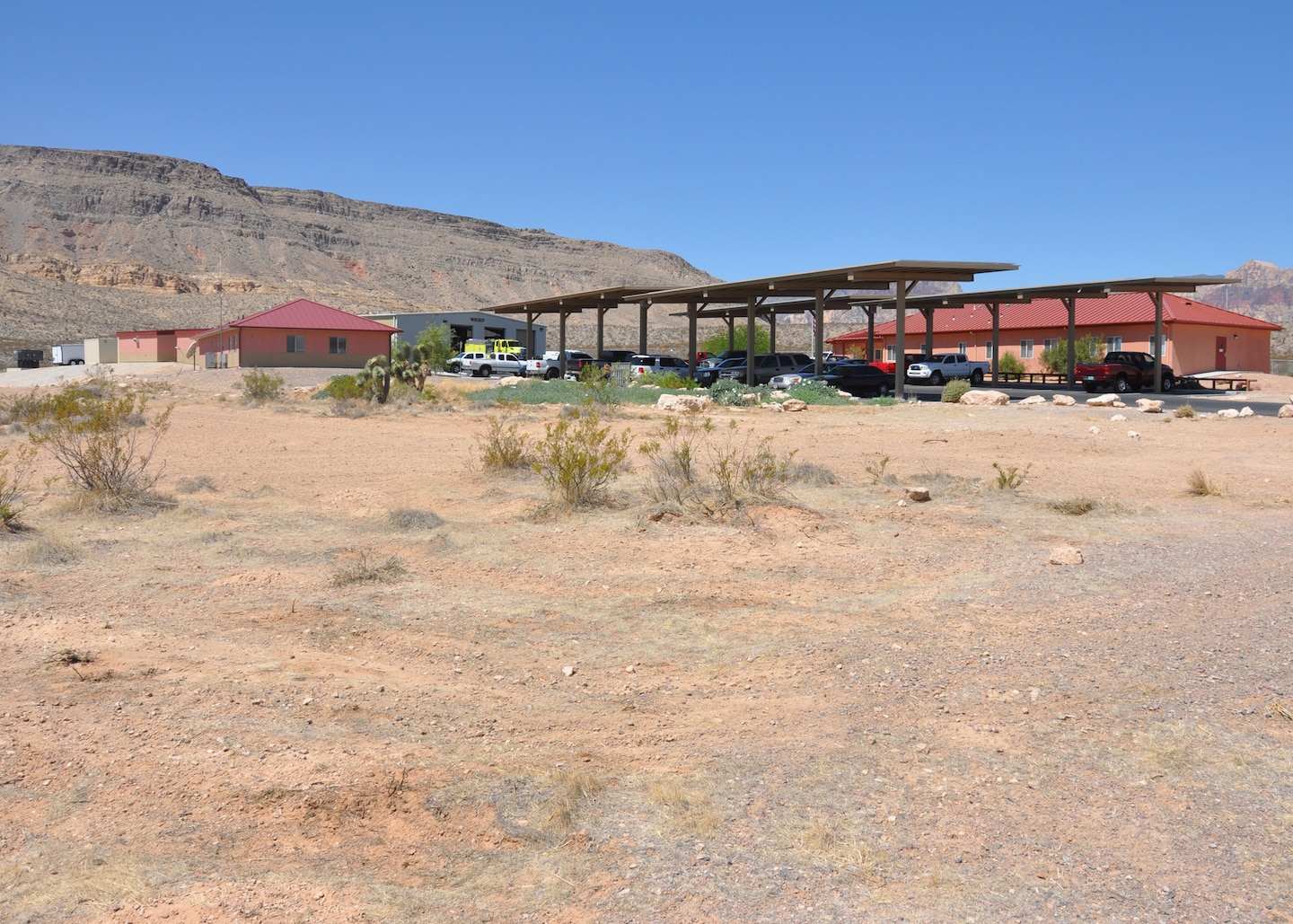 LAS VEGAS -- The U.S. Army Corps of Engineers Los Angeles District's Nellis Resident Office recently completed a solar panel project at the Bureau of Land Management's fire station at the Red Rock Canyon National Conservation Area near Las Vegas. The new photovoltaic system, installed in the carport canopies which were specially designed for the project, is capable of generating 40 KWAC to provide power for all the buildings on the facility. 