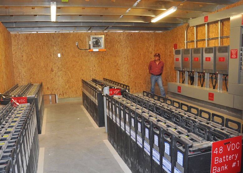 LAS VEGAS -- Viet Tran, a project engineer with the U.S. Army Corps of Engineers Los Angeles District's Nellis Resident Office, checks the battery room June 12 at the Bureau of Land Management's fire station at the Red Rock Canyon National Conservation Area near Las Vegas. The batteries are a backup system as part of the project the District recently completed in which they installed a photovoltaic system, capable of generating 40 KWAC, to provide power for the facility.