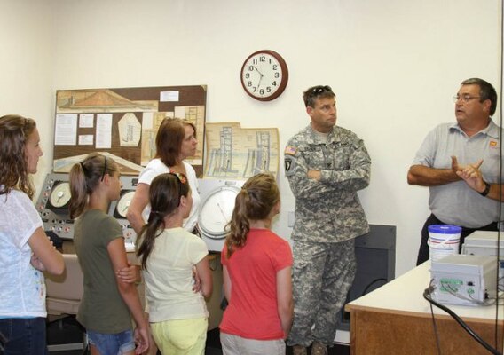 Blue Marsh Lake Dam Operator Jeff Omlor explains the purposes of the dam during Get Outdoors Day at Blue Marsh Lake. Families and children were able to take dam control tower tours as part of the activities. The U.S. Army Corps of Engineers Philadelphia District hosted the day to encourage outdoor activity and water safety.