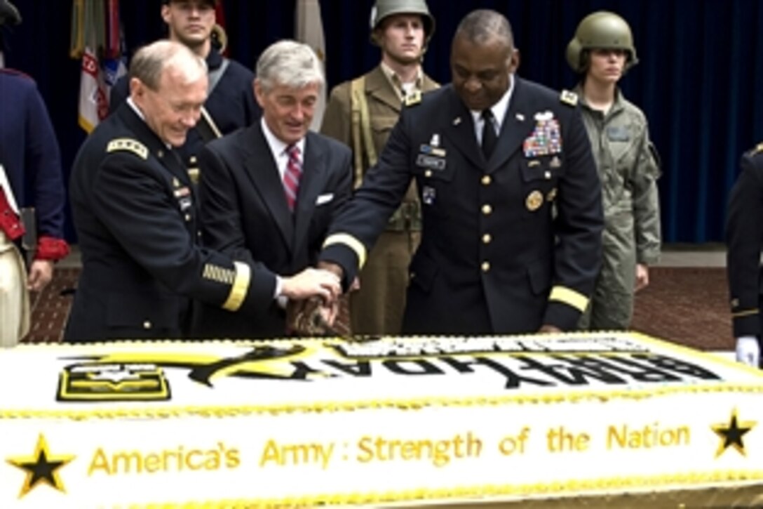 Army Gen. Martin E. Dempsey, chairman of the Joint Chiefs of Staff, joins Army Secretary John M. McHugh and Army Vice Chief of Staff Gen. Lloyd Austin in celebrating the Army's 237th birthday during a cake cutting ceremony in the courtyard of the Pentagon, June 14, 2012. 