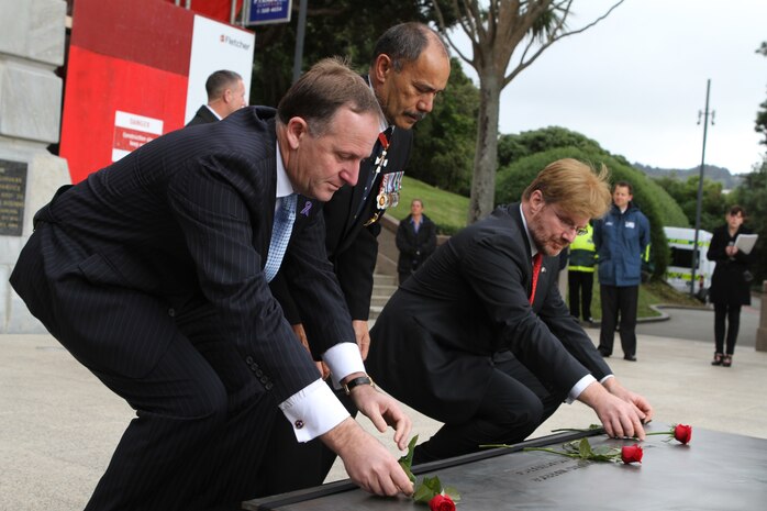 New Zealand Prime Minister John Key, Sir Jerry Mateparae, the Governor-General of New Zealand, and David Huebner, the U.S. Ambassador to New Zealand, lay roses on the Tomb of the Unknown Soldier during a commemoration ceremony here, June 14. Government and military officials of the United States and New Zealand commemorated the 70th anniversary of the arrival of U.S. forces in Wellington during World War II. Australian and New Zealand forces were conducting heavy fighting in Northern Africa in 1942 while U.S. forces played a significant role in the defense of Oceania.::r::::n::(U.S. Marine Corps photo by Sgt. Jacob H. Harrer)::r::::n::