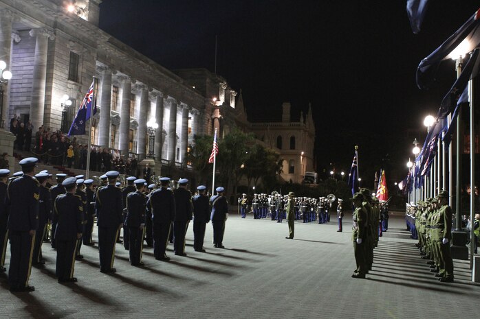 New Zealand soldiers and airmen and U.S. Marines form for a parade during the sunset ceremony at the Parliament House here, June 14. Government and military officials of the United States and New Zealand commemorated the 70th anniversary of the arrival of U.S. forces in Wellington during World War II. Australian and New Zealand forces were conducting heavy fighting in Northern Africa in 1942 while U.S. forces played a significant role in the defense of Oceania.::r::::n::(U.S. Marine Corps photo by Sgt. Jacob H. Harrer)::r::::n::