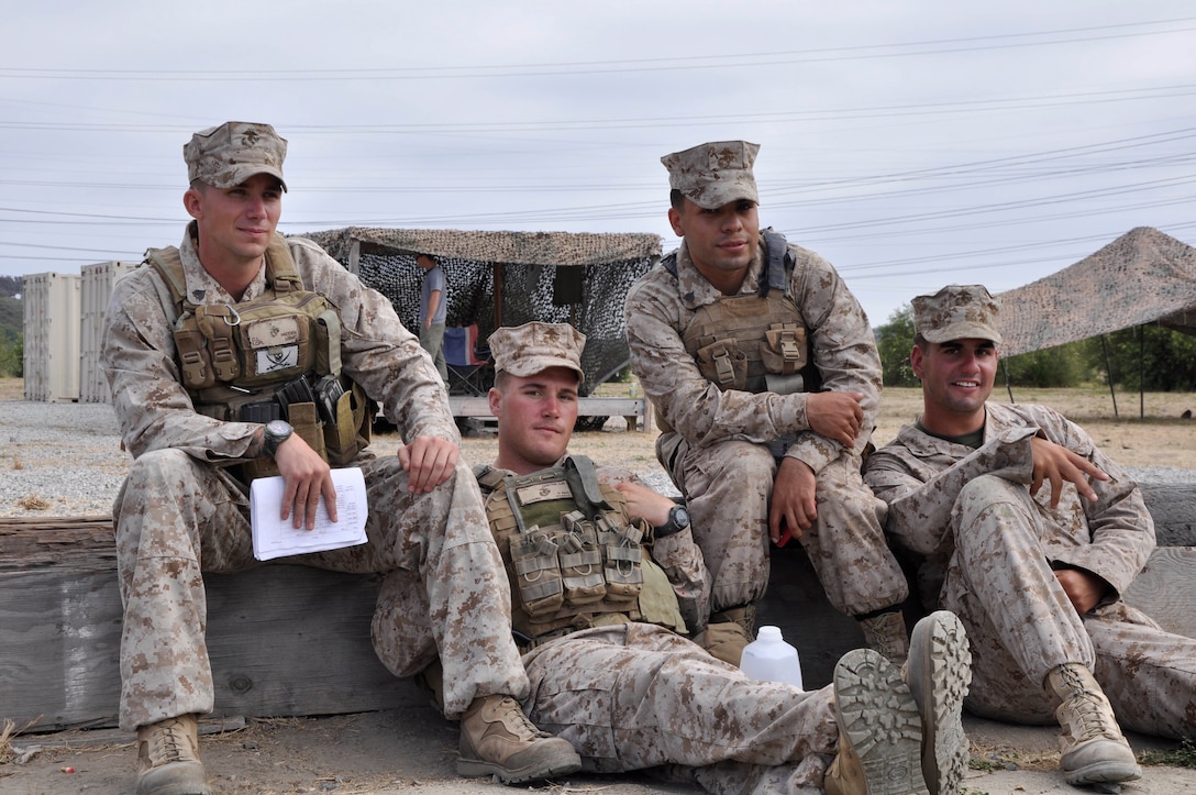 A group of Marine Riflemen (0311) from Second Battalion Fourth Marines (2/4), Volunteer as Infantry Squad leaders for Naval Reserve Officer Training Corp’s (NROTC) Midshipmen, during urban warfare training at the Annual Career Orientation for Midshipmen Summer Training Program, on Camp Pendleton, June 14. Midshipmen were introduced to the Marine Corps, military operations in urbanized terrain, counterinsurgency operations at the Infantry Immersion Trainer, the importance of small unit leadership and interactions with Marine officers and non-commissioned officers. They accomplished this by having squad and fire-team level urban scenarios, which integrated role-playing and culture training.