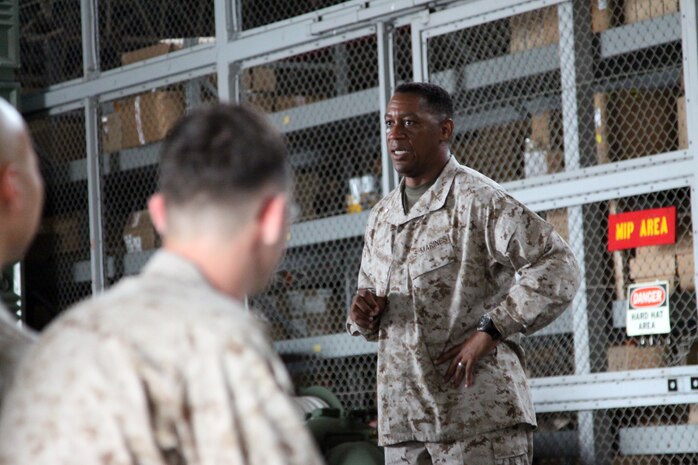 Brigadier General Craig C. Crenshaw, 3rd Marine Logistics Group commanding general, speaks to the Marines of Combat Logistics Company 36 as part of the 3rd MLG final visit here June 15, 2012, before changing command. Crenshaw informed the Marines that the work they do aboard Marine Corps Air Station Iwakuni is essential to the overall mission of 3rd MLG in support of 1st Marine Aircraft Wing.