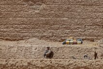 Benjamin, a rising eighth-grader at Quantico/Middle High School, snaps a photo of a weight-bearing tower during Quantico’s Science, Technology, Engineering and Mathematics Academy on Friday. During the competition, weight was applied to the students’ hand-built balsa wood towers to determine which tower had the highest strength-to-weight ratio.