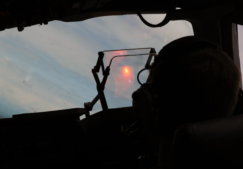 1st. Lt. James Hammelman, a pilot from the 535th Airlift Squadron at Joint Base Pearl Harbor-Hickam, Hawaii, flies a C-17 Globemaster III aircraft during a tactical low-level flight June 15 as part of the RED FLAG-Alaska military exercise. RED FLAG-Alaska is one of the largest international air-combat employment exercises in the world and is designed to test the specific capabilities of the military units that take part in the exercise and increase their chance of survival during actual combat. (U.S. Air Force photo by Capt. Ben Sakrisson)