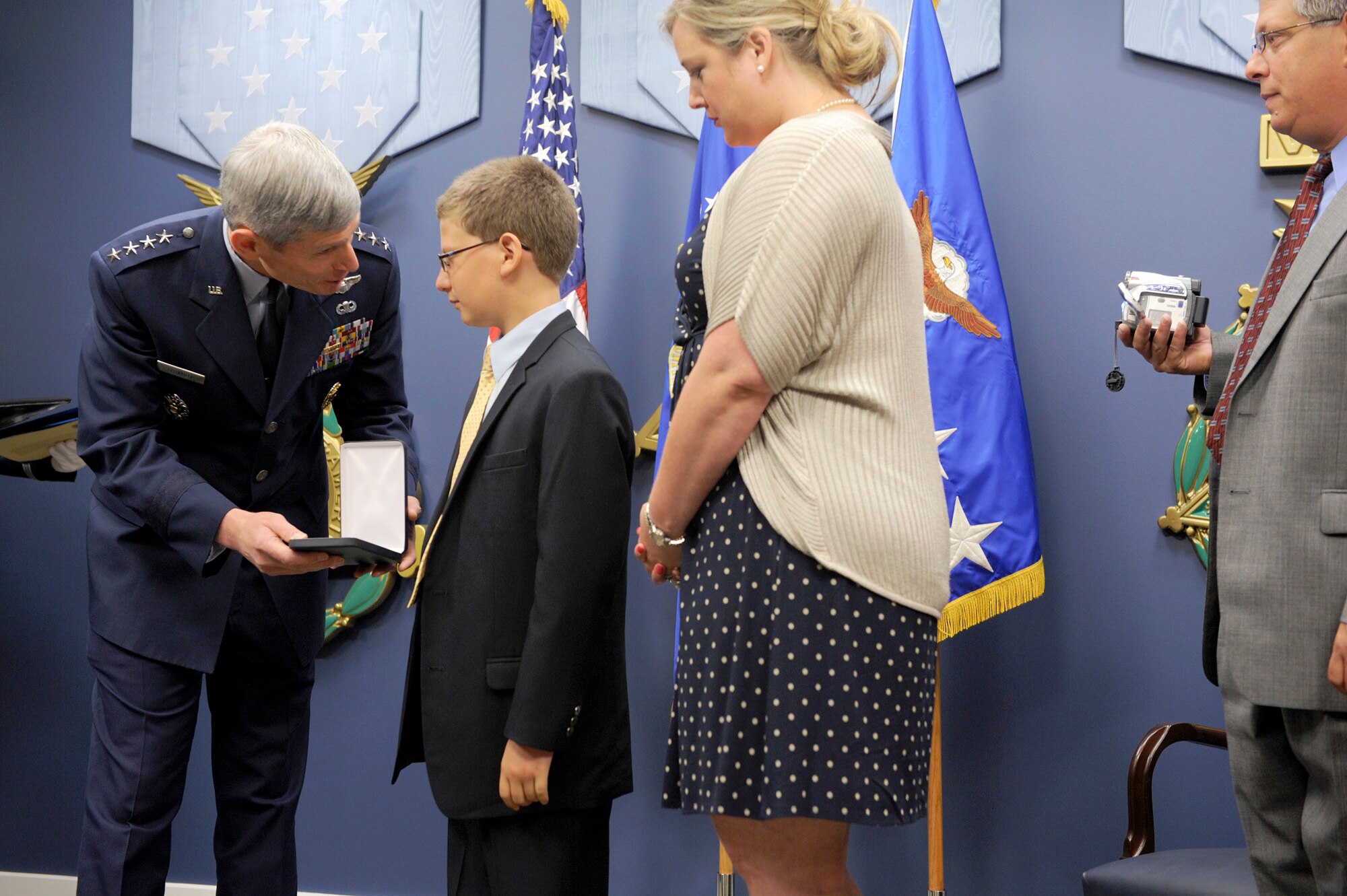 Air Force Chief of Staff Gen. Norton Schwartz presents the Silver Star, posthumously awarded to Capt. Francis Gary Powers, to the captain’s grandchildren, Francis Gary “Trey” Powers III and Lindsey Barry, on June 15, 2012, in the Pentagon. Captain Powers was shot down over the Soviet Union on May 1, 1960, and received the decoration for the heroism he displayed while held prisoner by the Soviets.  He was released in 1962 but subsequently died in a 1977 helicopter crash. (U.S. Air Force photo/Senior Airman Christina Brownlow)