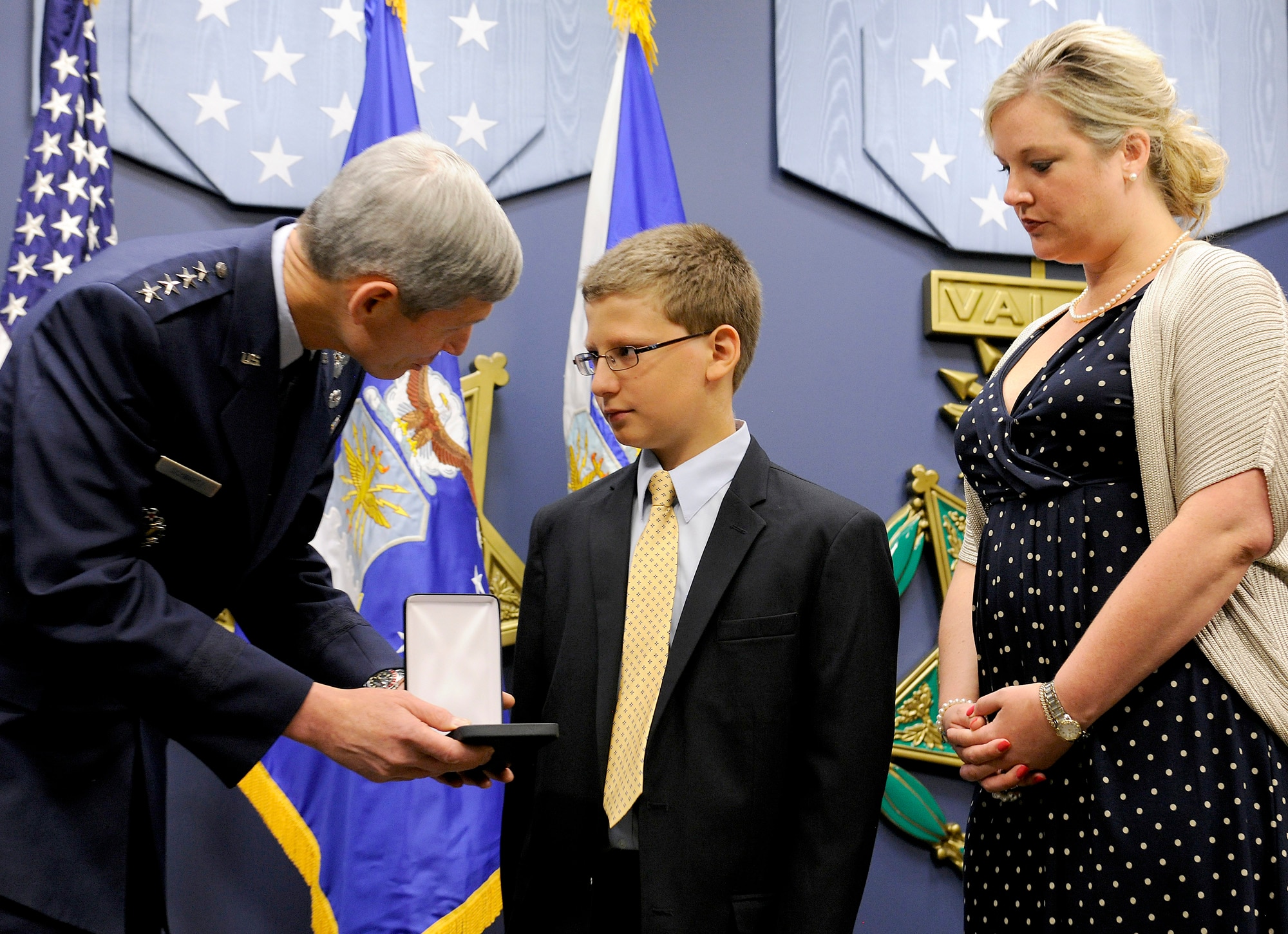 Air Force Chief of Staff Gen. Norton Schwartz presents the Silver Star, posthumously awarded to Capt. Francis Gary Powers, to the captain’s grandchildren, Francis Gary “Trey” Powers III and Lindsey Barry, on June 15, 2012, in the Pentagon. Captain Powers was shot down over the Soviet Union on May 1, 1960, and received the decoration for the heroism he displayed while held prisoner by the Soviets. He was released in 1962 but subsequently died in a 1977 helicopter crash. (U.S. Air Force photo/Scott M. Ash)