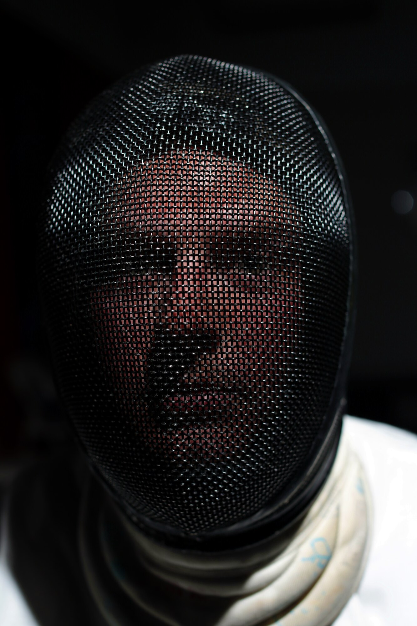 COLORADO SPRINGS, Colo. -- Weston Kelsey, 310th Force Support Squadron supply officer, poses with his fencing mask at the U.S. Olympic Training Center June 8, 2012. Kelsey, 2011 U.S. Air Force Male Athlete of the Year, helped the U.S. Men’s Epee Team defeat the six-time reigning World Champion French team to become the first U.S. Men’s fencing team to win gold at the World Team Championships. (U.S. Air Force photo by Staff Sgt. Kathrine McDowell)
