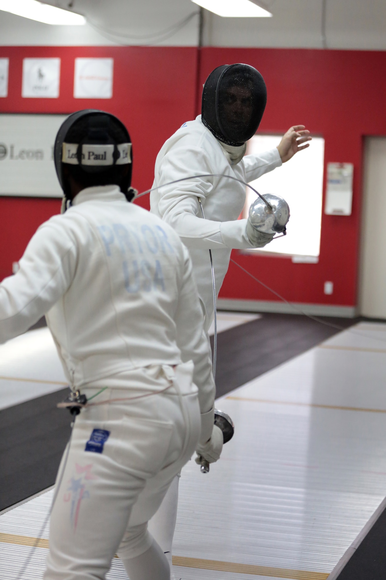 COLORADO SPRINGS, Colo. – Weston Kelsey, an Air Force captain with the 310th Force Support Squadron, checks the scoreboard during a bout at the U.S. Olympic Training Center June 8, 2012. Kelsey, U.S. Air Force Male Athlete of the Year and now three-time Olympian, takes his place as the anchor for the U.S. Men’s Epee Team. (U.S. Air Force photo by Staff Sgt. Kathrine McDowell)