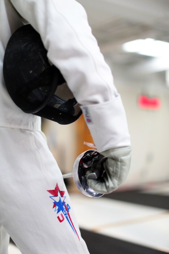COLORADO SPRINGS, Colo. – Shown is the fencing mask, bell guard and U.S. Olympic insignia of Weston Kelsey, 310th  Force Support Squadron supply officer and three-time Olympian, June 8, 2012. Kelsey was named the 2011 U.S. Air Force Male Athlete of the Year. (U.S. Air Force photo by Staff Sgt. Kathrine McDowell)