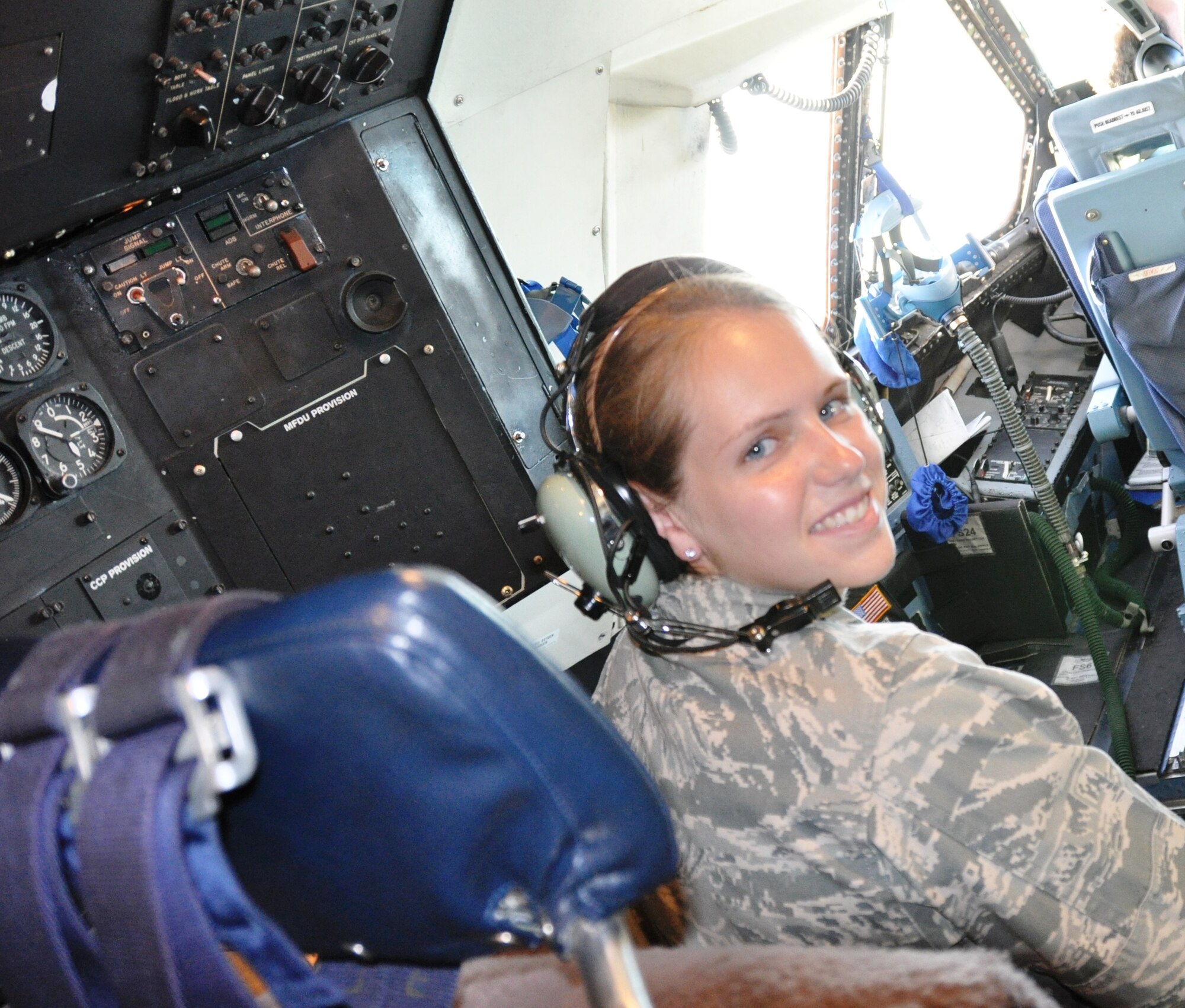 Air Force Academy Cadet Second Class Kari A. Baker sits in the naviagtor's seat during an aerial refueling mission. An aircrew from the 433rd Airlift Wing took 12 cadets on an orientation flight of the C-5A Galaxy to familiarize them with the capabllities of the aircraft and the wing's mission. (U.S. Air Force photo/ Tech. Sgt. Carlos J. Trevino) 