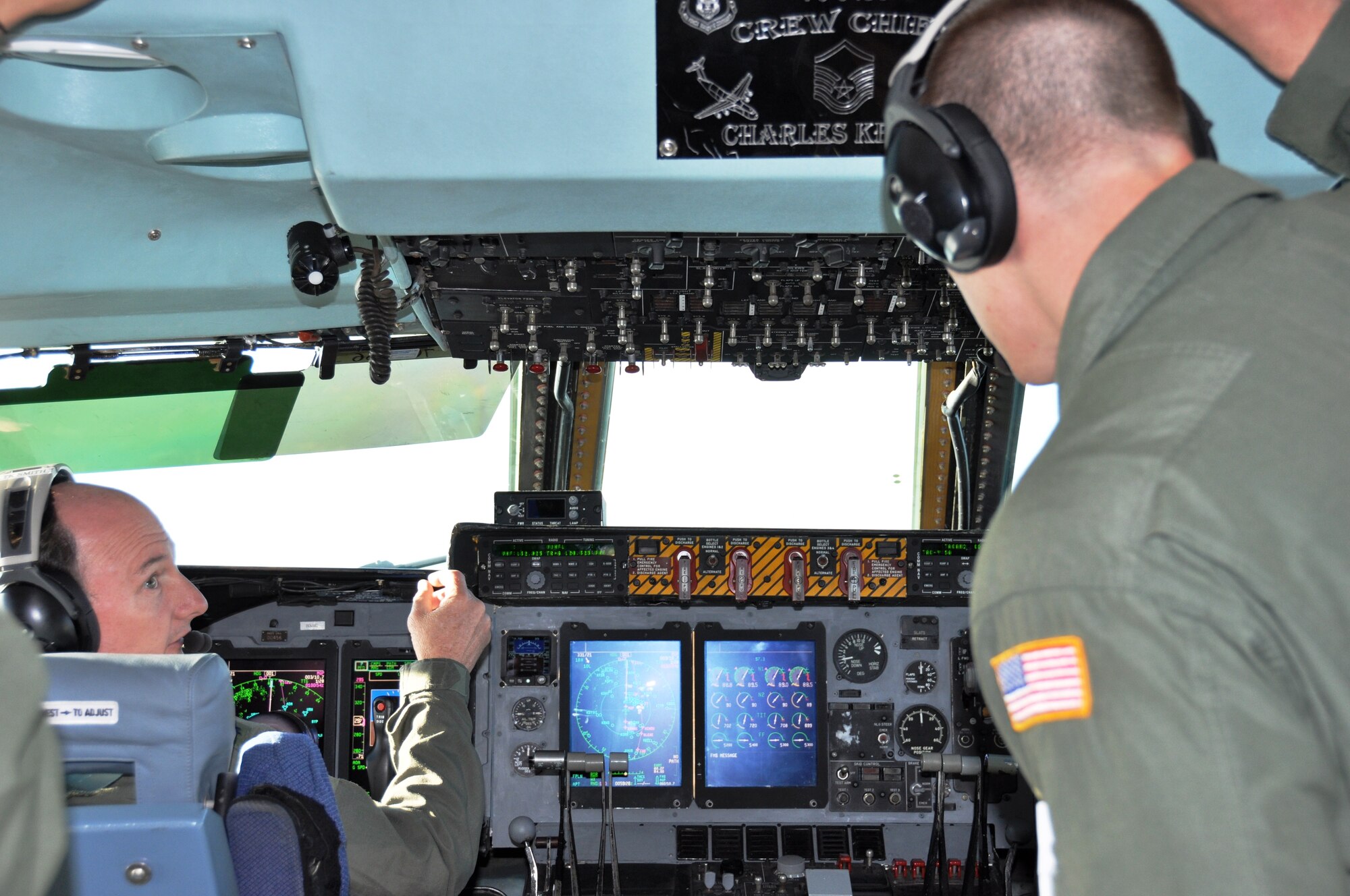 Lt. Col. Thomas K. Smith, 433rd Operations Group, deputy commander (left) explains the aerial refueling mission to Air Force Academy Cadet Second Class Ryan J. Gourley. Cadets from the Air Force Academy got to observe an orientation flight of the C-5A Galaxy cargo aircraft. (U.S. Air Force photo/ Tech. Sgt. Carlos J. Trevino) 