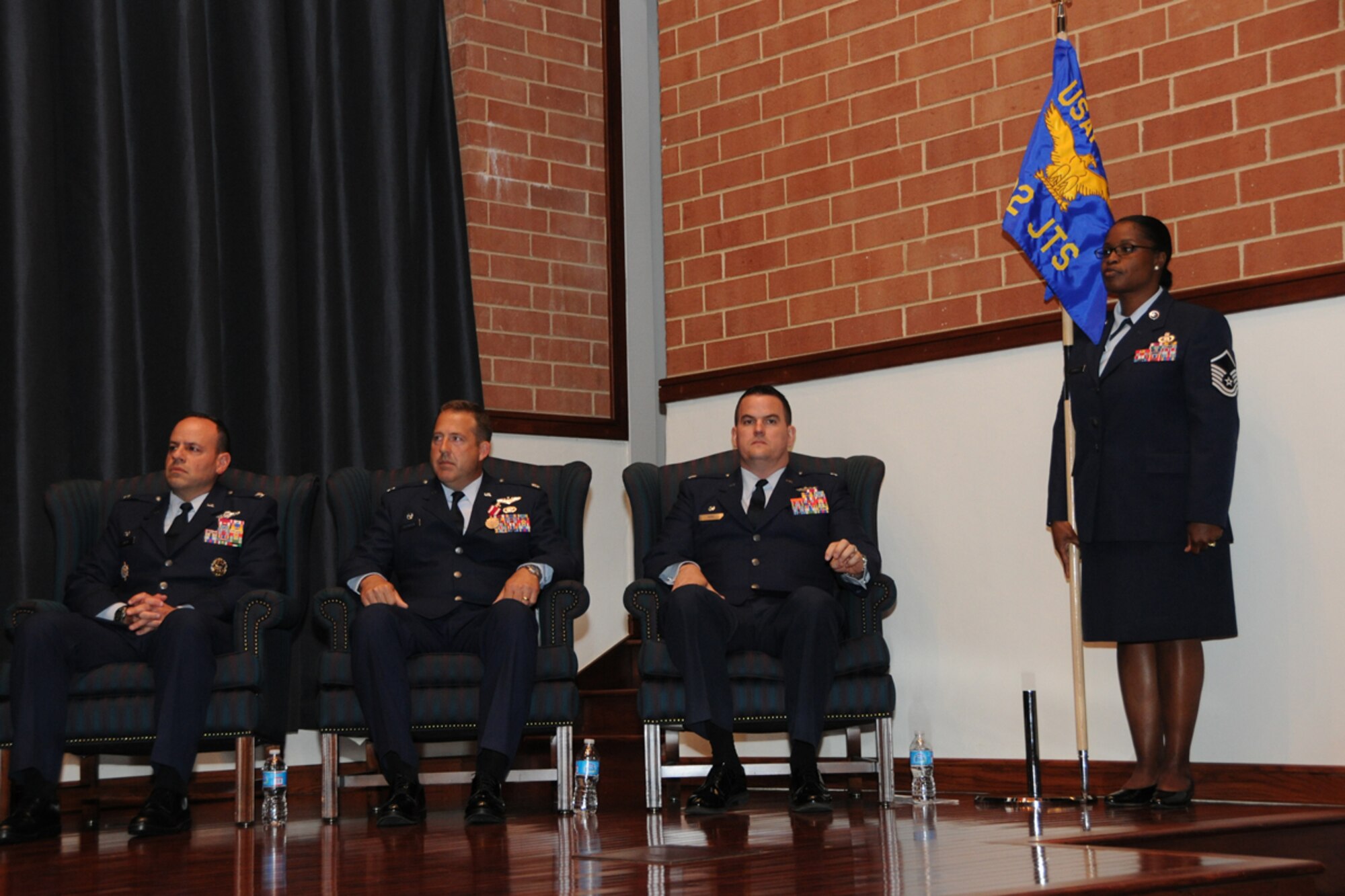 Col. Patrick Owens, Expeditionary Operations School commander, Lt. Col. Scott Robinson, outgoing 422nd Joint Tactics Squadron commander, Lt. Col Wesley Kirk, 422nd JTS commander and Master Sgt. Vivian Bender, 422nd JTS superintendant, prepare to officially transfer command during the squadron's change-of-command ceremony June 15 at Joint Base McGuire-Dix-Lakehurst, N.J. (U.S. Air Force photo by Tech. Sgt. Zachary Wilson/Released)
