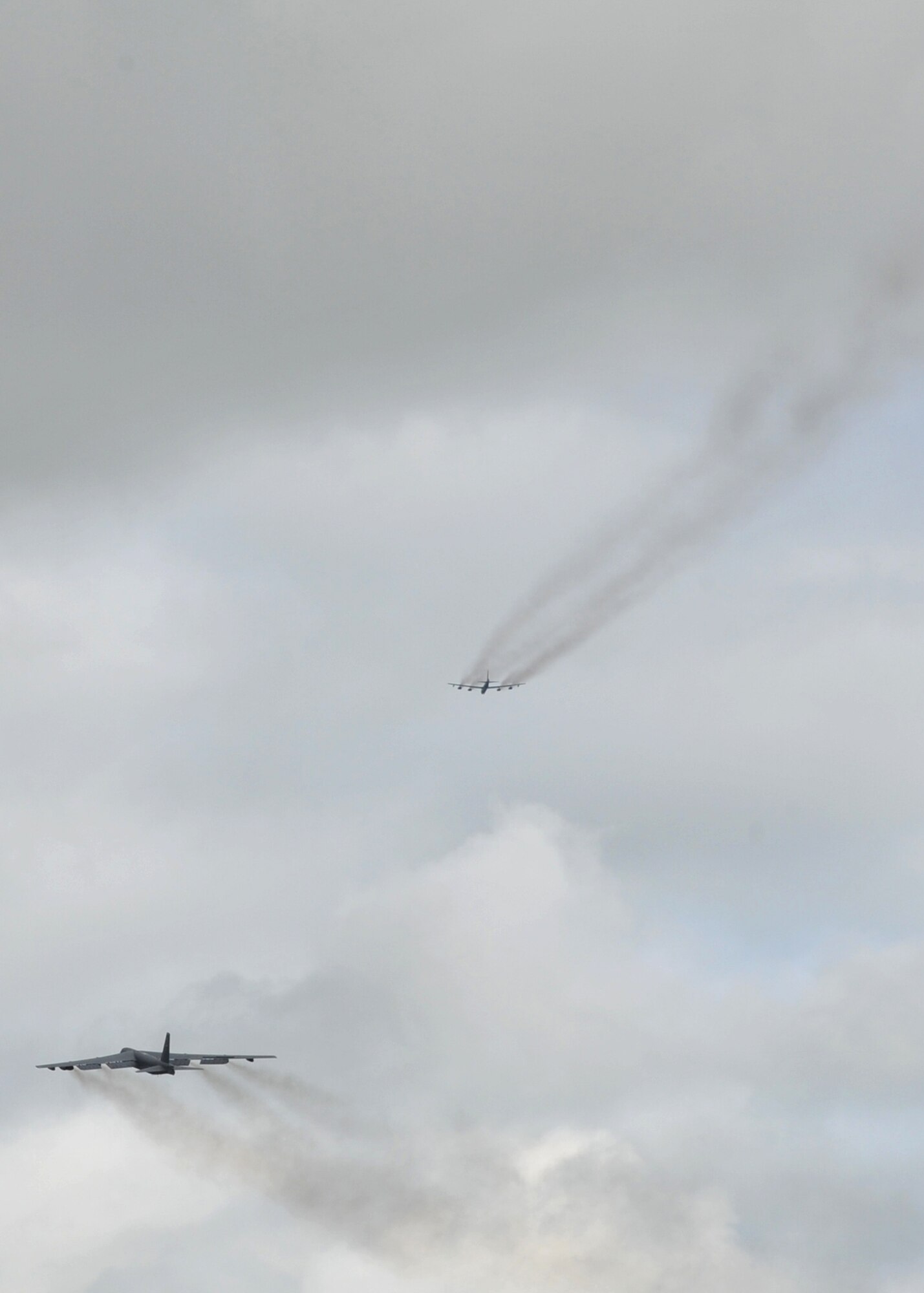 MINOT AIR FORCE BASE, Mo. -- B-52s take off from Minot June 7 during a multi-aircraft generation in support of an Air Force Global Strike Command exercise, Constant Vigilance. The Command routinely conducts training exercises to confirm that forces and weapons can perform their mission when called upon. (U.S. Air Force photo by Senior Airman Brittany Y. Auld)(Released)