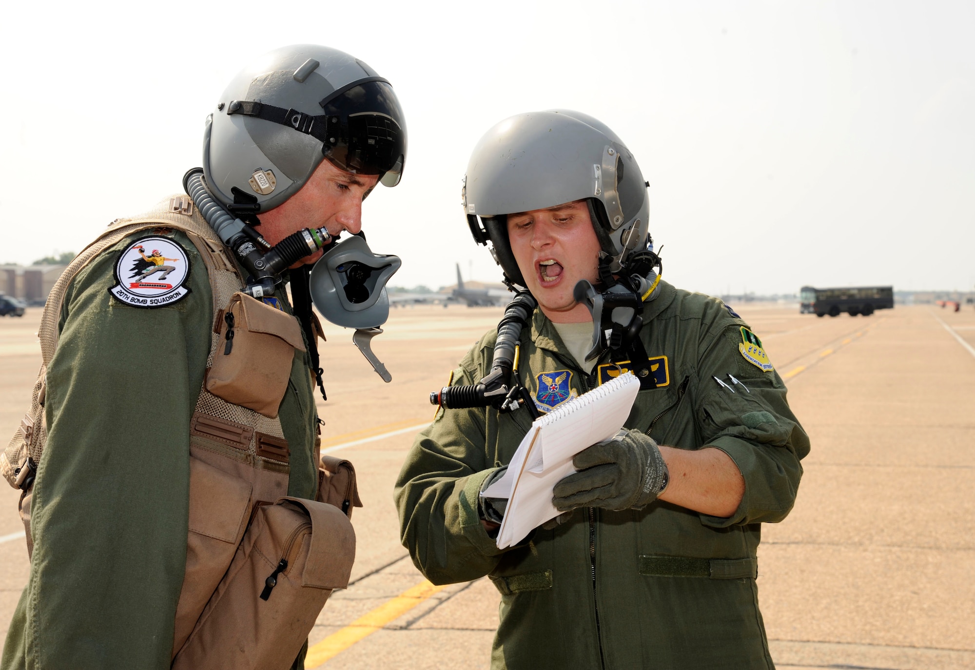 BARKSDALE AFB, La. -- B-52H Stratofortress aircrew members assigned to the 20th Bomb Squadron review mission plans before boarding a 2nd Bomb Wing B-52H at Barksdale Air Force Base, La., June 10 for a flight mission in support of Exercise BALTOPS 2012. The exercise brought together forces from 12 countries for the largest multinational maritime exercise this year in the Baltic Sea the first two weeks in June. In its 40th year, Exercise BALTOPS aims to improve maritime security in the Baltic Sea through increased interoperability and cooperation among regional allies. The 2 BW routinely participates in worldwide exercises to constantly refine and improve operational procedures and capabilities with other U.S. services and our allies. (U.S. Air Force photo/Airman 1st Class Andrew Moua)(RELEASED)