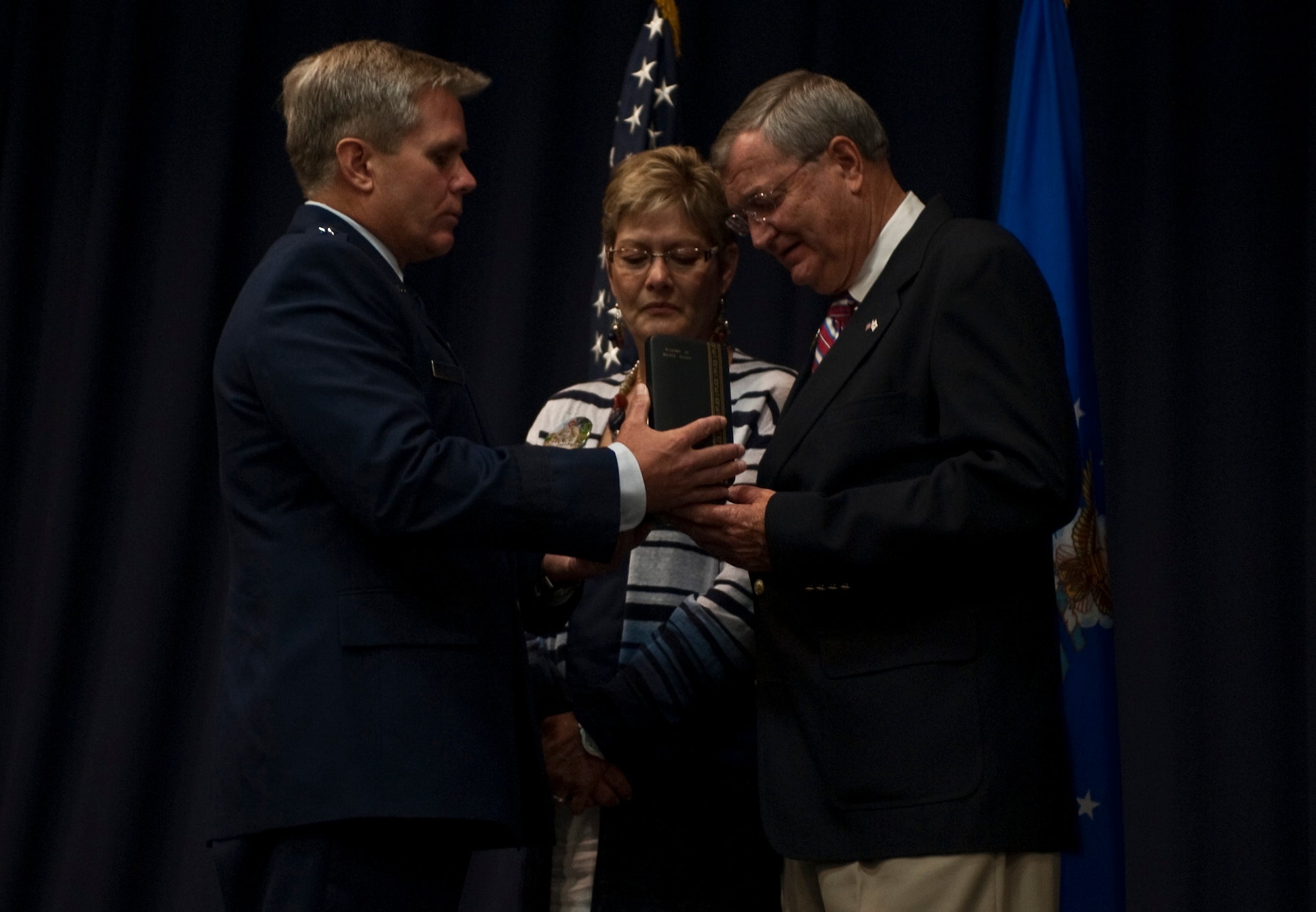 U.S. Air Force Lt. Gen. Eric E. Fiel, commander of Air Force Special Operations Command, presents a Silver Star Medal to Ray and Pat Forester at the King Auditorium, Hurlburt Field, Fla., Jun. 15, 2012. The award was presented on behalf of their son, Senior Airman Mark Forester, who died in combat in Afghanistan Sept. 29, 2010. (U.S. Air Force Photo/Airman 1st Class Hayden K. Hyatt)