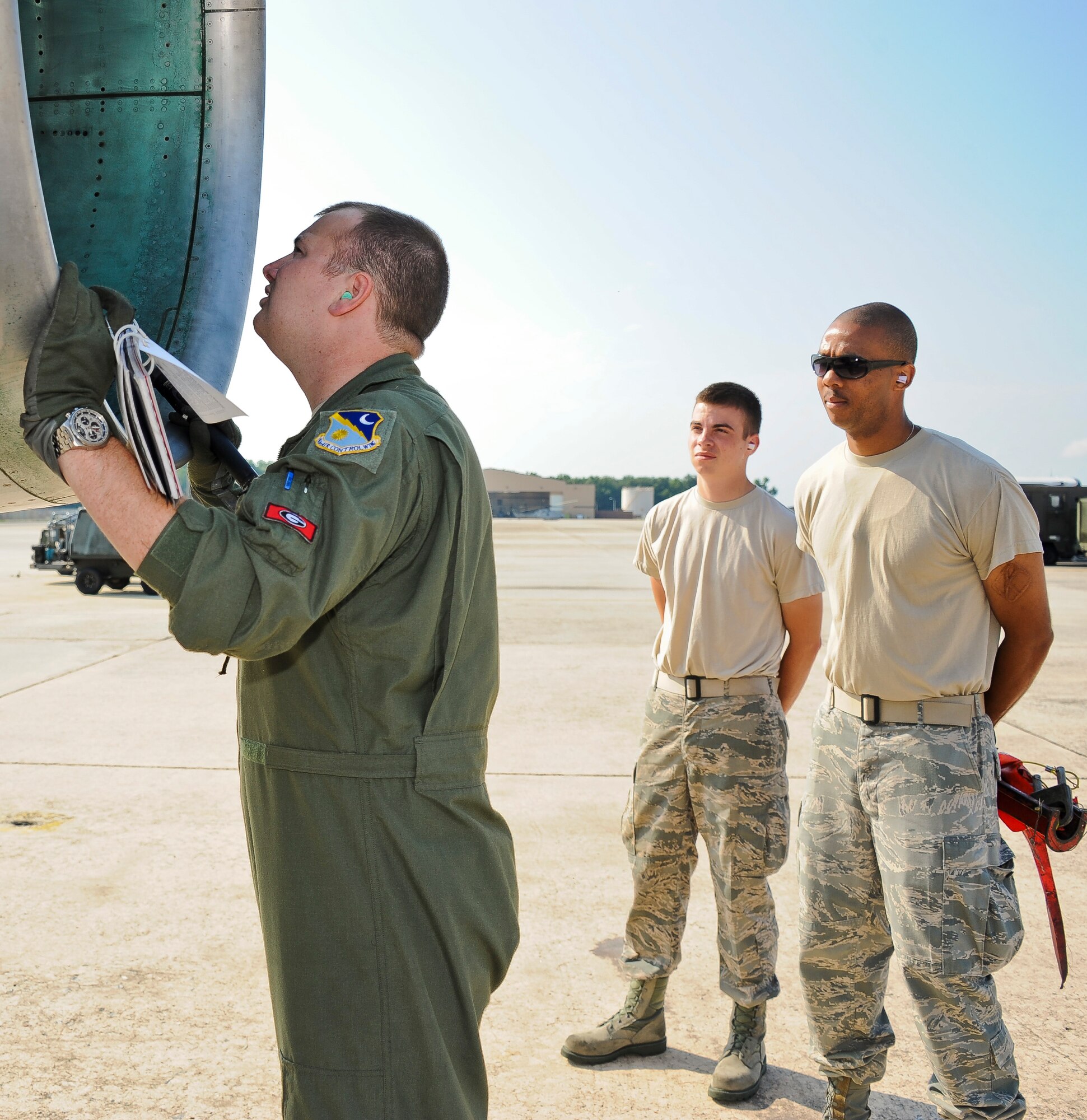 A flight engineer and two crew chiefs from Team JSTARS inspect the engine inlet of an E-8 Joint STARS in preparation for a sortie in support of Iron Dagger 2012.  The sortie was the last one for JSTARS in the week-long exercise conducted at Robins Air Force Base along with F-15E Strike Eagles from Seymour Johnson Air Force Base, N.C. (U.S. Air Force photo by Master Sgt. Roger Parsons)