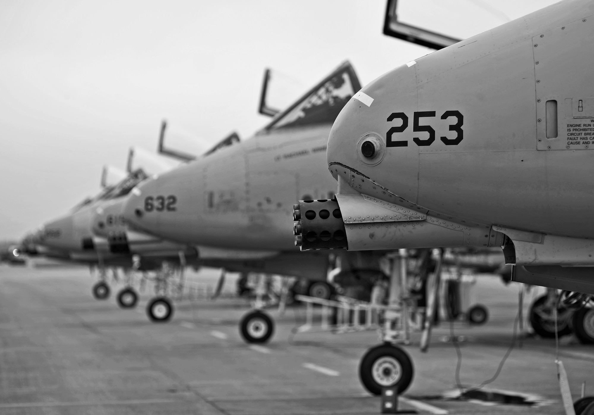 A row of A-10 Thunderbolts II sit quietly before the day starts during RED FLAG-Alaska 12-2 June 11, 2012, Eielson Air Force Base, Alaska.  RF-A is a Pacific Air Forces-sponsored, two-week-long exercise that allows joint and coalition partners  to exchange tactics, techniques and procedures as well as improve interoperability.  The A-10 Thunderbolt II is assigned to the 25 Fighter Squadron, Osan Air Base, Republic of Korea.  (U.S. Air Force photo/Staff Sgt. Miguel Lara III)