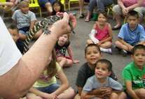 KIRTLAND AFB, N.M. – Volunteers from the ABQ BioPark Zoo brought a variety of animals Saturday to share with the Kirtland Air Force Base Library’s summer reading club. The next summer reading program event — “Snakes Alive” — will be 9:30 a.m. to 1 p.m. June 23 at the library. (Photo by Karen Keene)