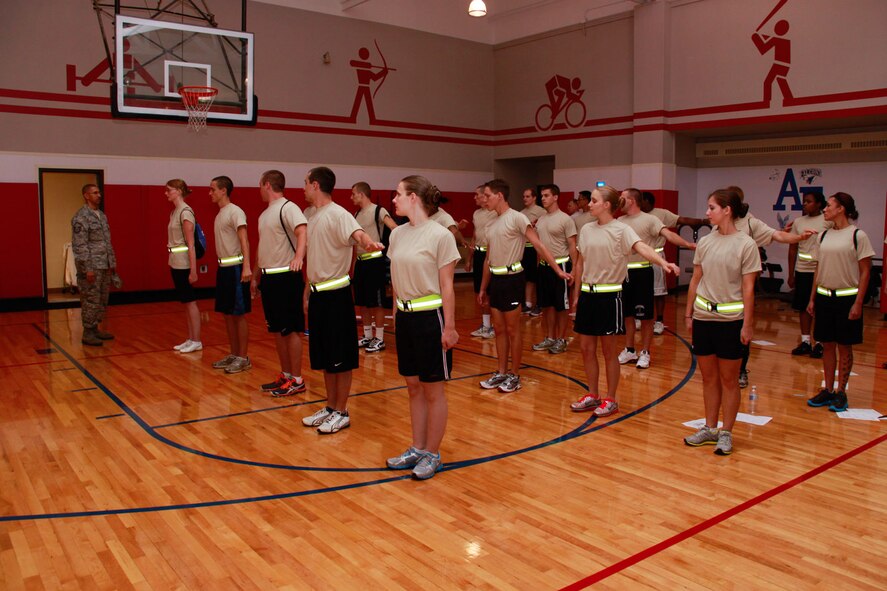 The Development and Training Flight performs an open ranks inspection at the command of Master Sgt. Christopher Johnson, NCO in charge, in the Fitness Center at the 911th Airlift Wing, June 2, 2012. The DTF gives newly enlisted Airmen a chance to prepare for the challenges they will face at Basic Military Training. Before the DTF program began, new recruits went to BMT without information on topics such as drill and ceremony practice, reporting statements, and Air Force customs and courtesies. (U.S. Air Force photo by Airman 1st Class Justyne Obeldobel/Released)

